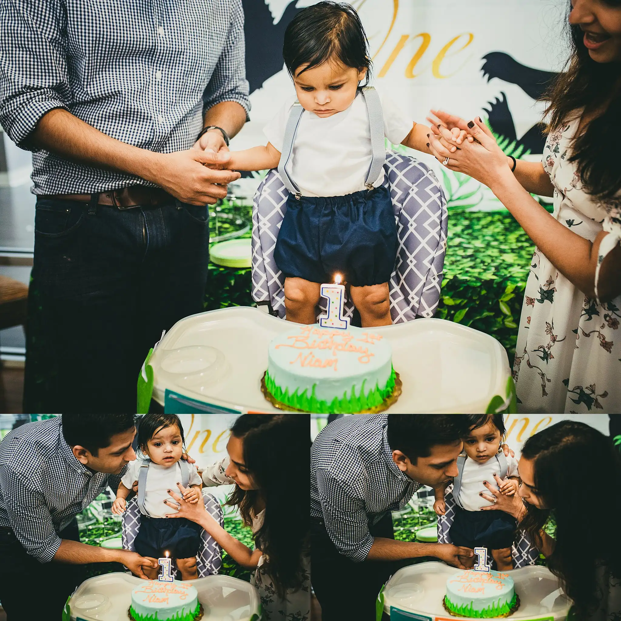 Party: the birthday boy held up to his cake, in a set, at a first birthday party in Atlanta, GA