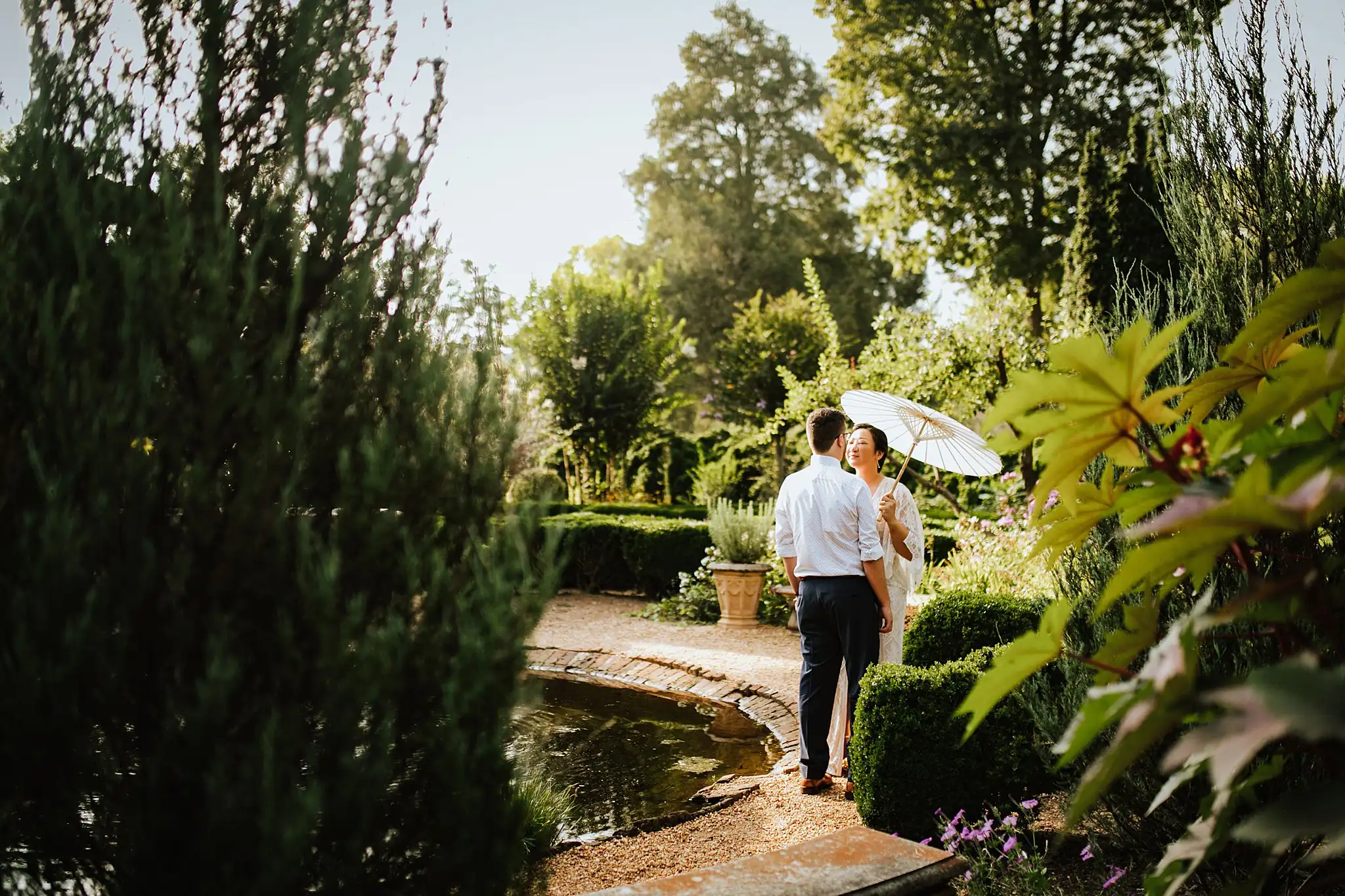 AtlantaWeddingPhotographers_0484.jpg Wedding Formals: the couple by the pool in the clipped garden, at their wedding at Barnsley Gardens Resort in Adairsville, GA