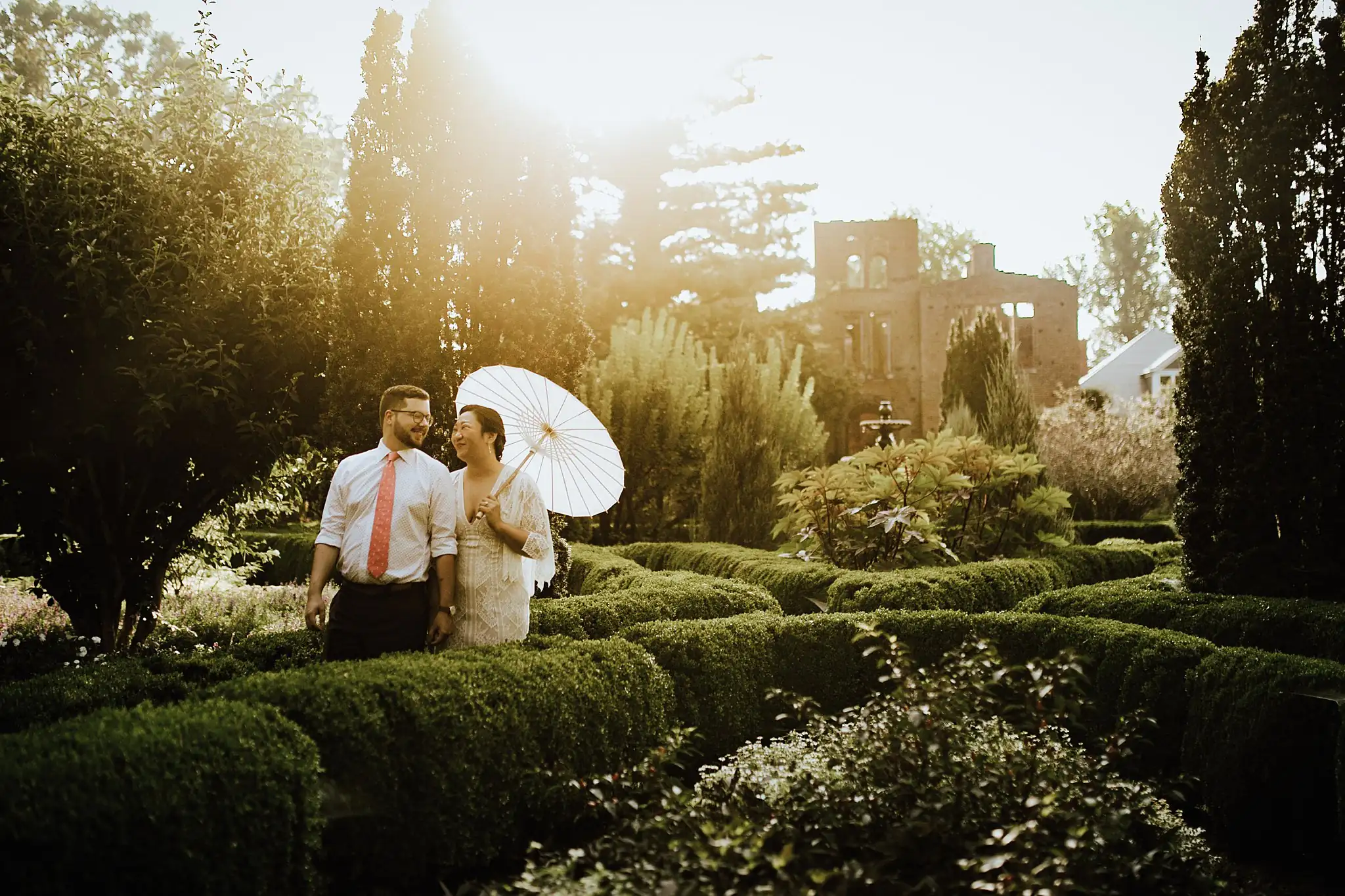 AtlantaWeddingPhotographers_0485.jpg Wedding Formals: the two of them above the boxwood with the ruins beyond, at their wedding at Barnsley Gardens Resort in Adairsville, GA