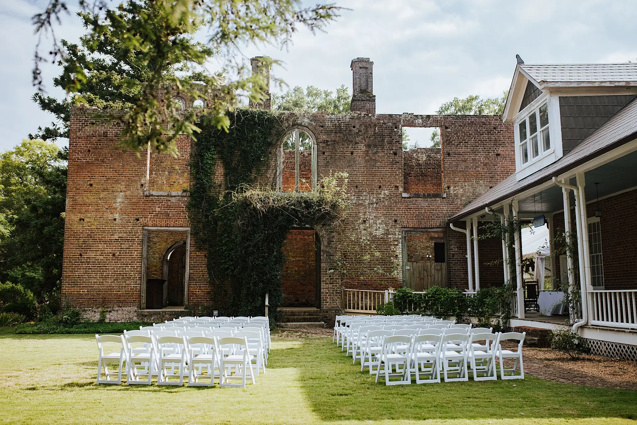 AtlantaWeddingPhotographers_0488.jpg Wedding Ceremony: the chairs set on the lawn in front of the ruins, at a wedding at Barnsley Gardens Resort in Adairsville, GA