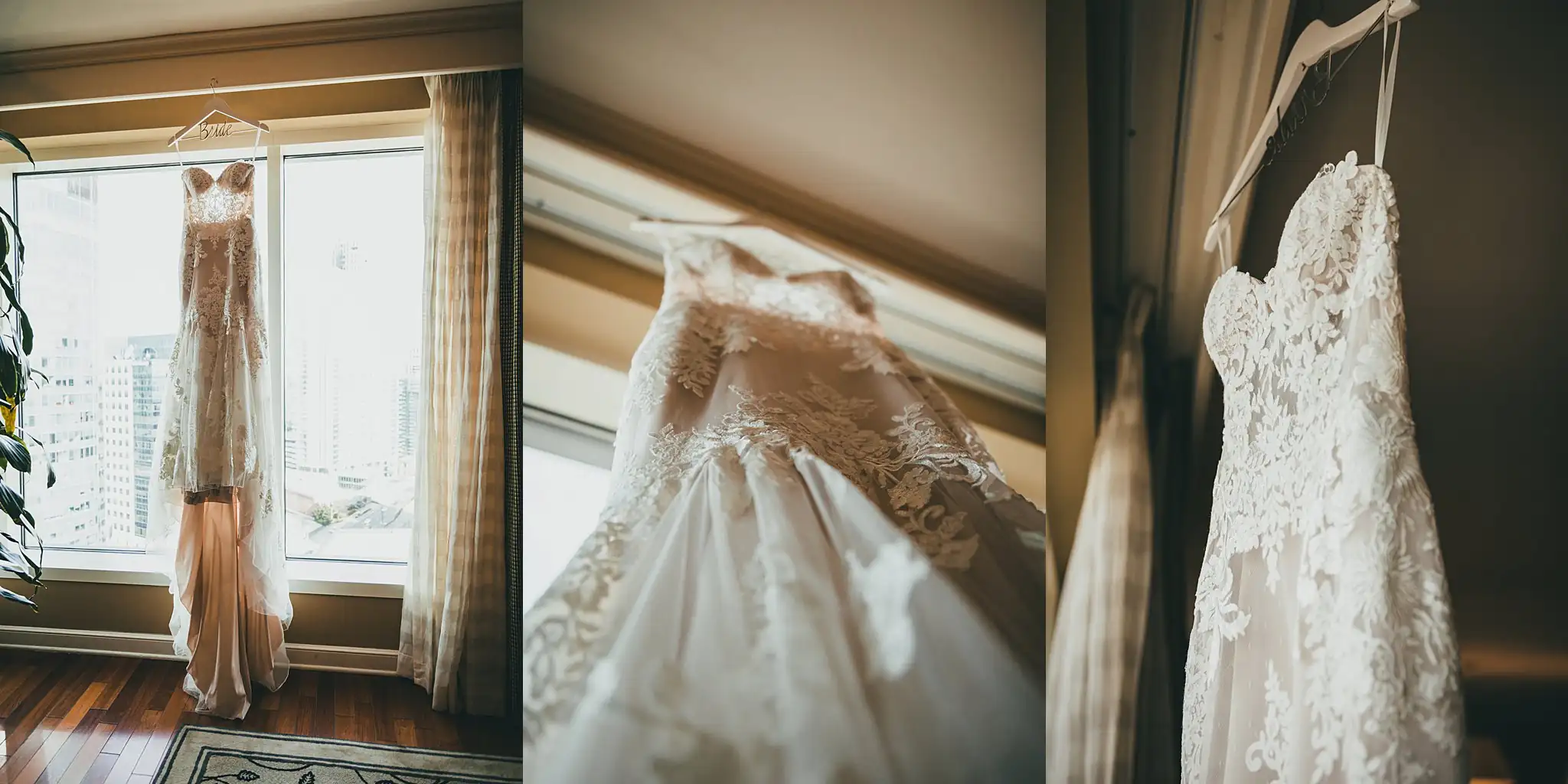 Wedding Details: the gown hanging in the window above the city, at a wedding at the Westside Warehouse in Atlanta, GA