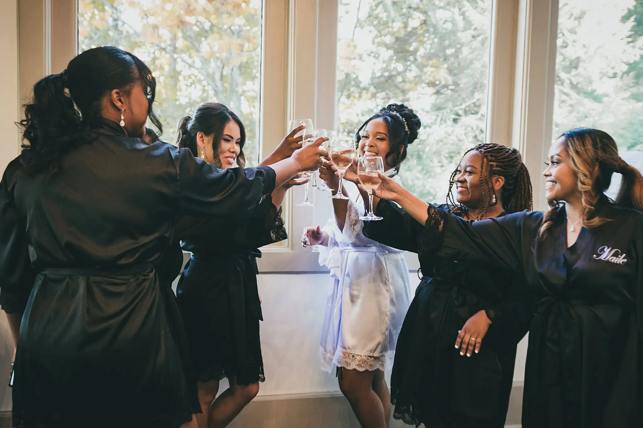 AtlantaWeddingPhotographers_0661.jpg Getting Ready: the bride and her bridesmaids toasting together, before their wedding at the Country Club of the South in Johns Creek, GA