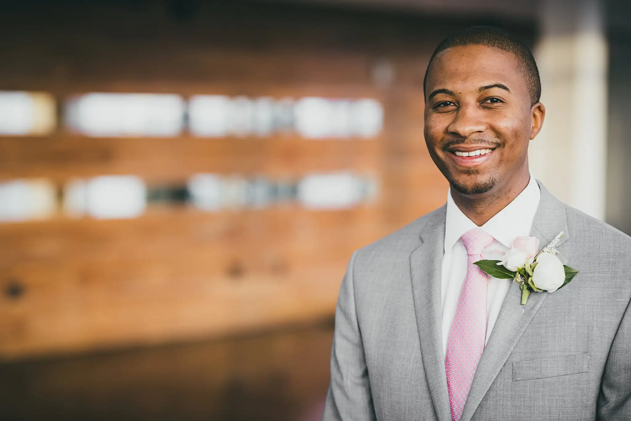 Portraits: the groom in his grey suit and pink tie, at their elopement at Ventanas in Atlanta, GA