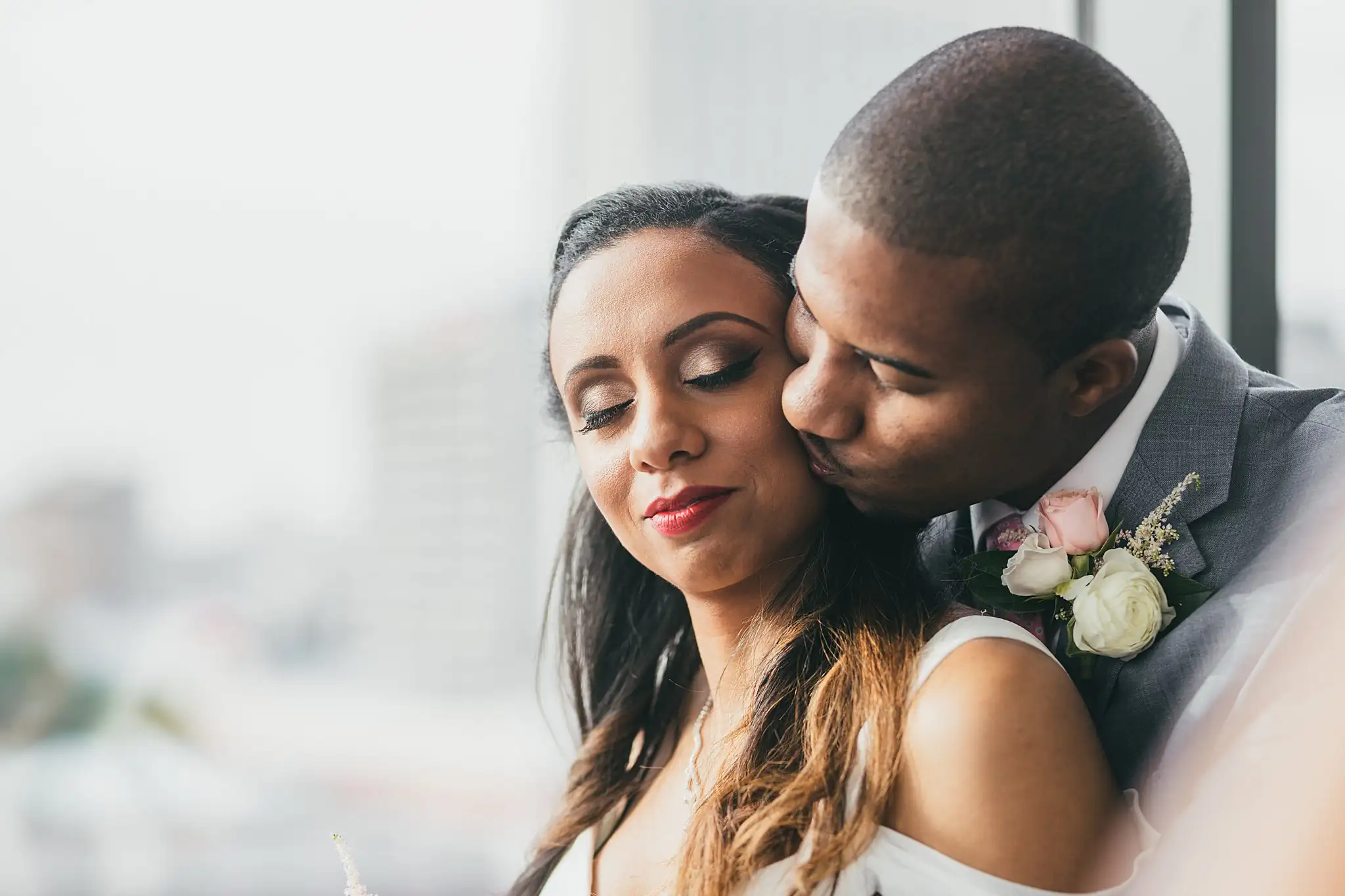 Wedding Formals: the groom kissing the bride's cheek, at their elopement at Ventanas in Atlanta, GA