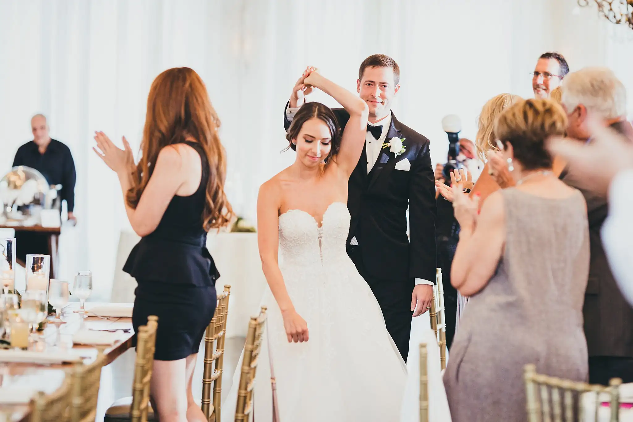 Wedding Reception: the couple's grand entrance to applause, at their wedding at Little River Farms in Milton, GA
