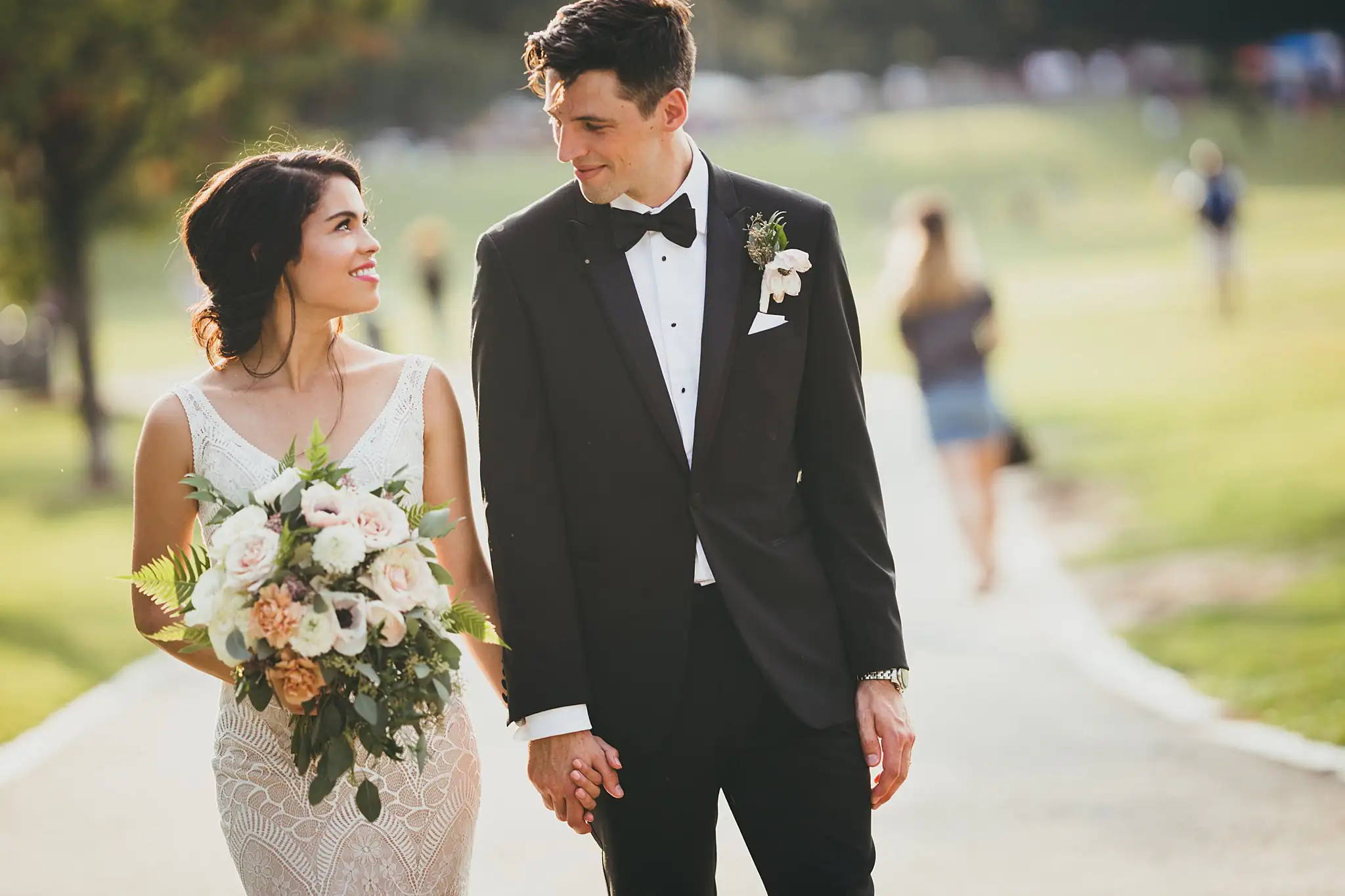 Wedding Formals: the couple walking the park path, at their wedding at the Piedmont Garden Tent in Atlanta, GA