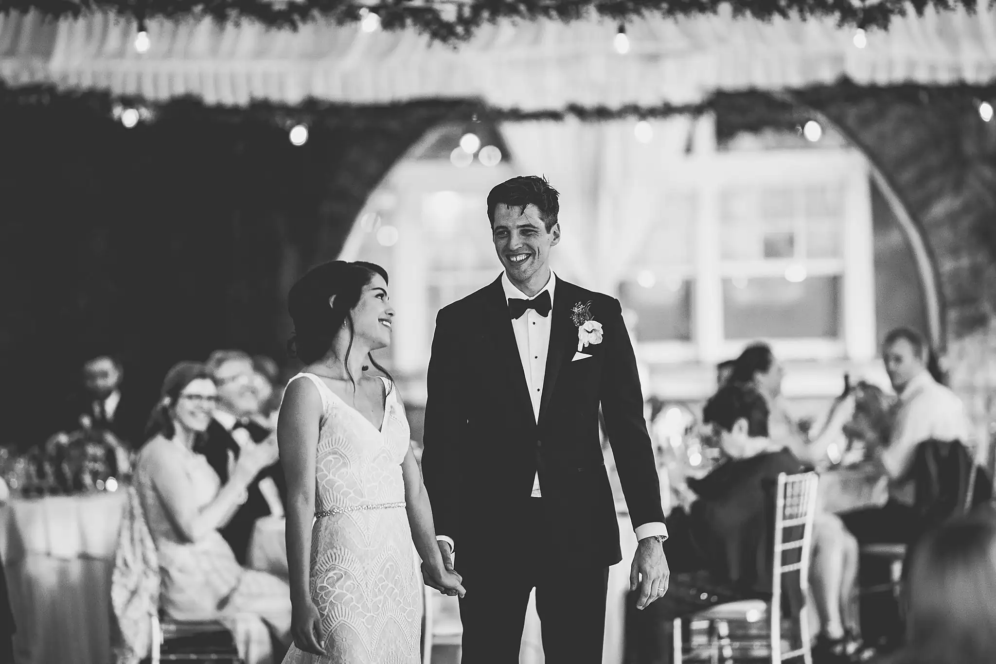 Wedding Reception: the couple at the reception, in black and white, at their wedding at the Piedmont Garden Tent in Atlanta, GA
