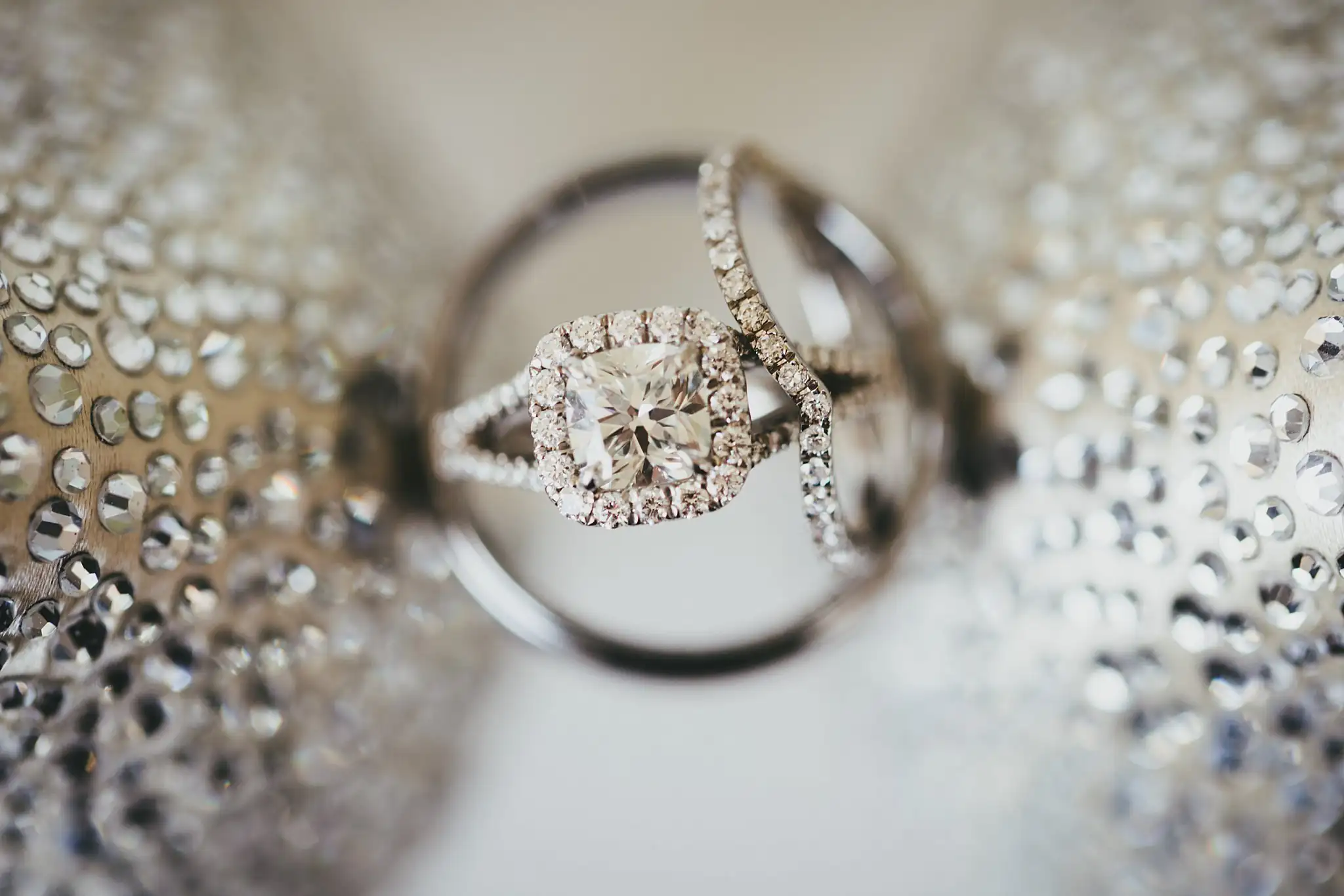 Wedding Details: the engagement ring and bands, close, at a wedding at Houston Lake Country Club in Perry, GA