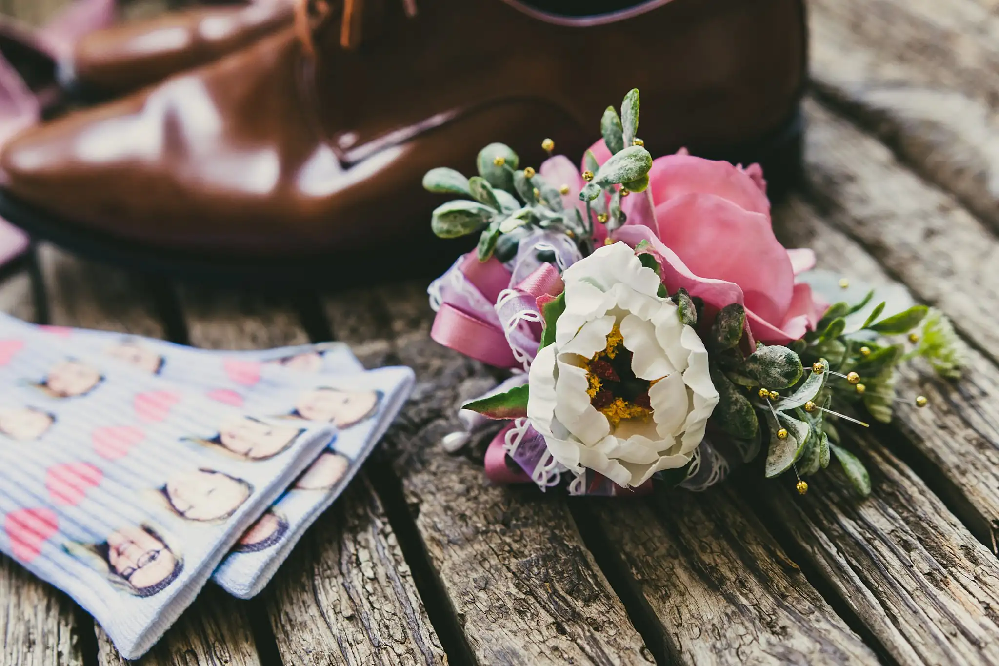 Wedding Details: the groom's oxfords and patterned socks, at a wedding at Houston Lake Country Club in Perry, GA
