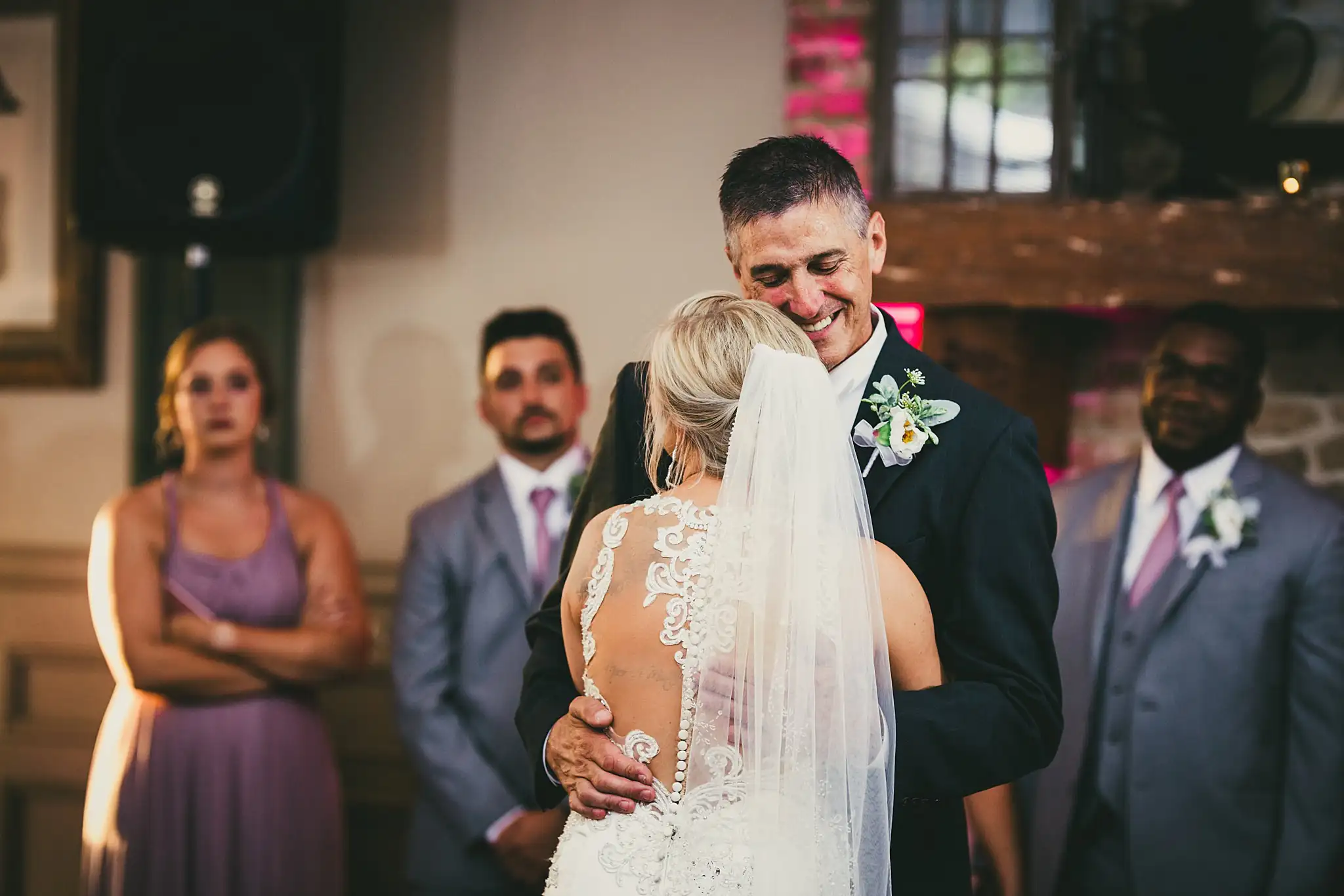 First Dance: the couple dancing as the bridal party watch, at their wedding at Houston Lake Country Club in Perry, GA
