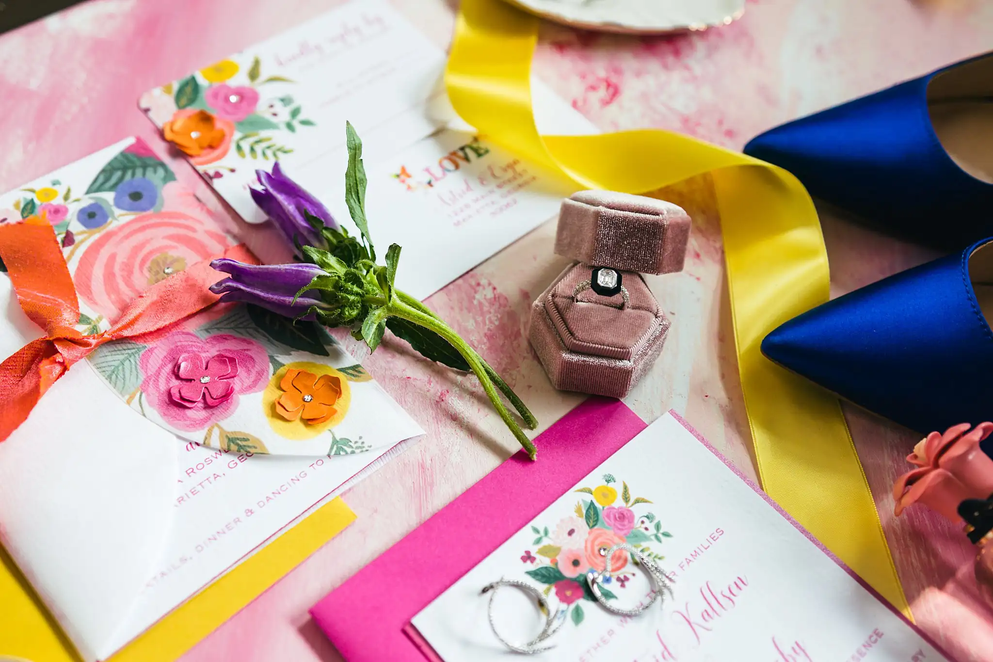 AtlantaWeddingPhotographers_1191.jpg Wedding Details: the invitation with a heel and flowers, at a Whimsically in Love LGBTQ Wedding styled shoot at Brick and Ivey in Marietta, GA