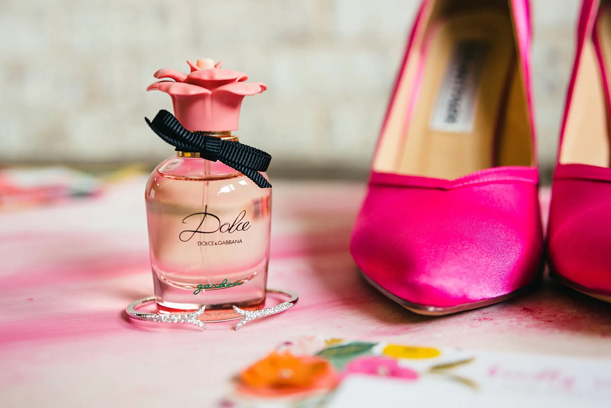 AtlantaWeddingPhotographers_1193.jpg Wedding Details: a rose-topped perfume by pink heels, at a Whimsically in Love LGBTQ Wedding styled shoot at Brick and Ivey in Marietta, GA