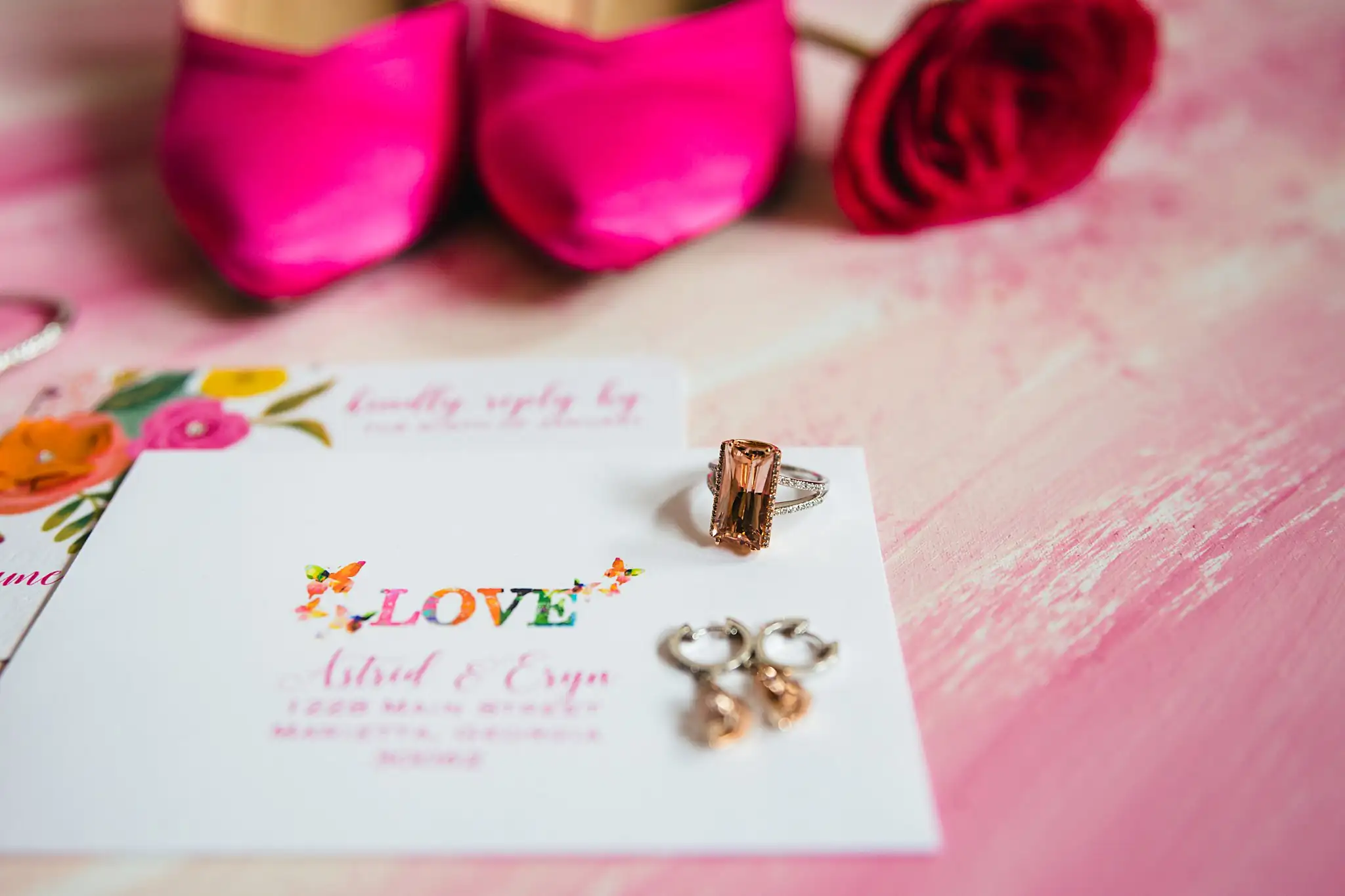 AtlantaWeddingPhotographers_1194.jpg Wedding Details: pink heels and a rose on the invitation, at a Whimsically in Love LGBTQ Wedding styled shoot at Brick and Ivey in Marietta, GA