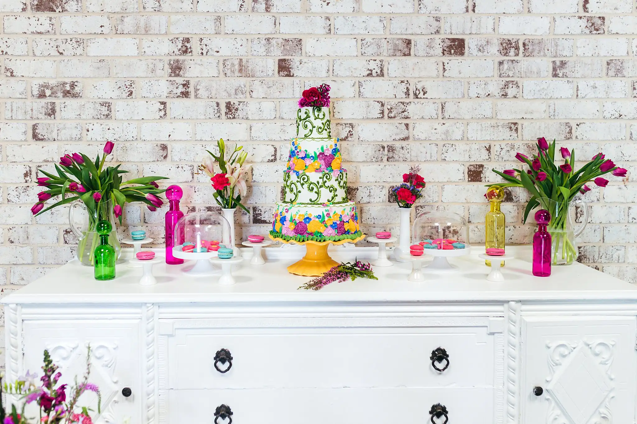 AtlantaWeddingPhotographers_1202.jpg Reception Details: the dessert table on a white dresser, at a Whimsically in Love LGBTQ Wedding styled shoot at Brick and Ivey in Marietta, GA