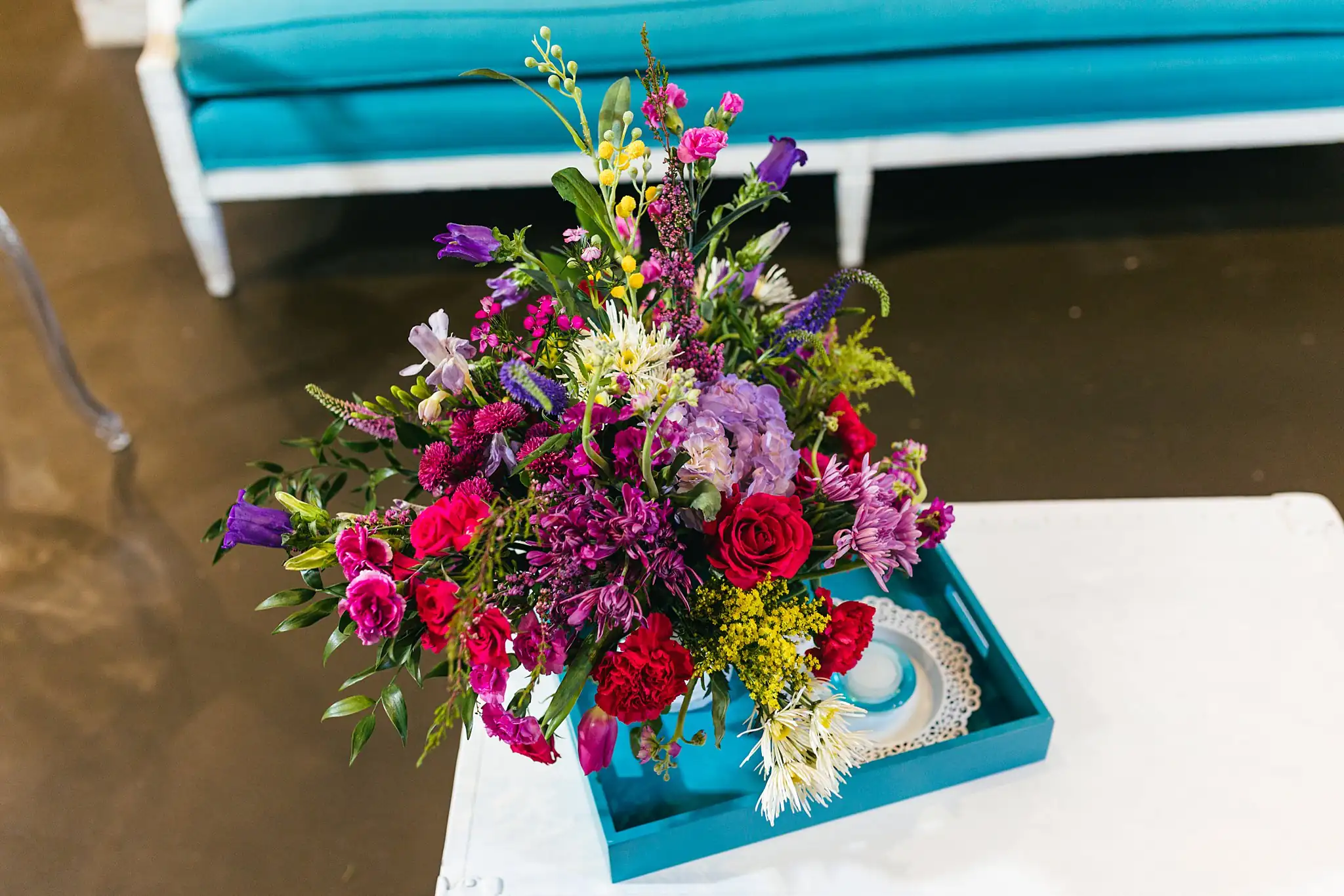 AtlantaWeddingPhotographers_1204.jpg Wedding Florals: a bright arrangement set on a teal tray, at a Whimsically in Love LGBTQ Wedding styled shoot at Brick and Ivey in Marietta, GA