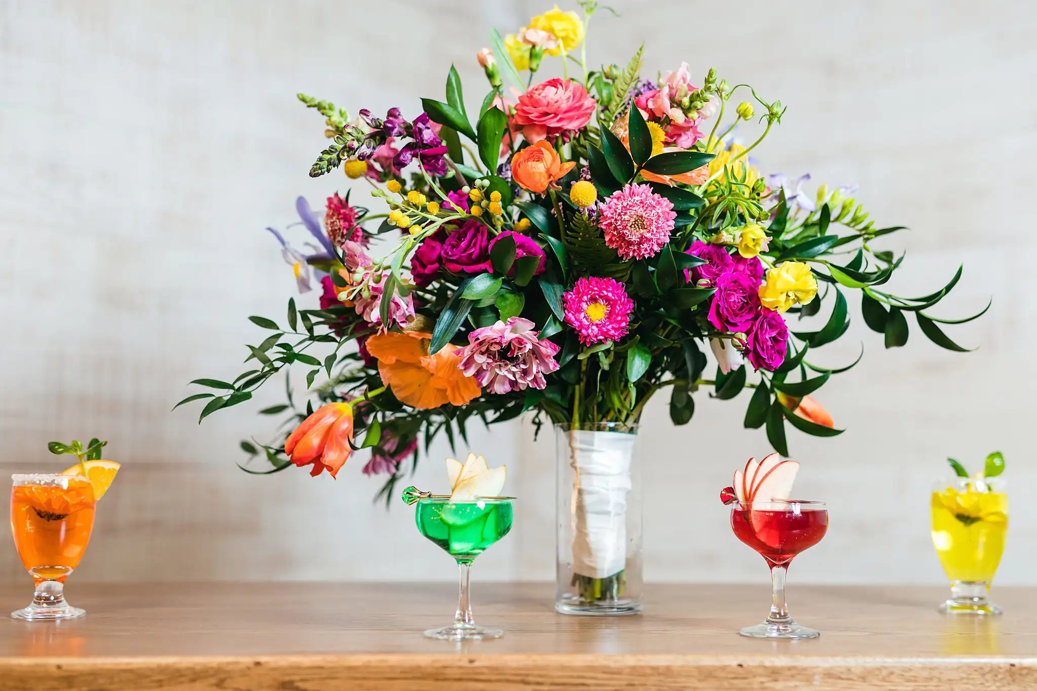 AtlantaWeddingPhotographers_1207.jpg Wedding Florals: a tall arrangement flanked by cocktails, at a Whimsically in Love LGBTQ Wedding styled shoot at Brick and Ivey in Marietta, GA