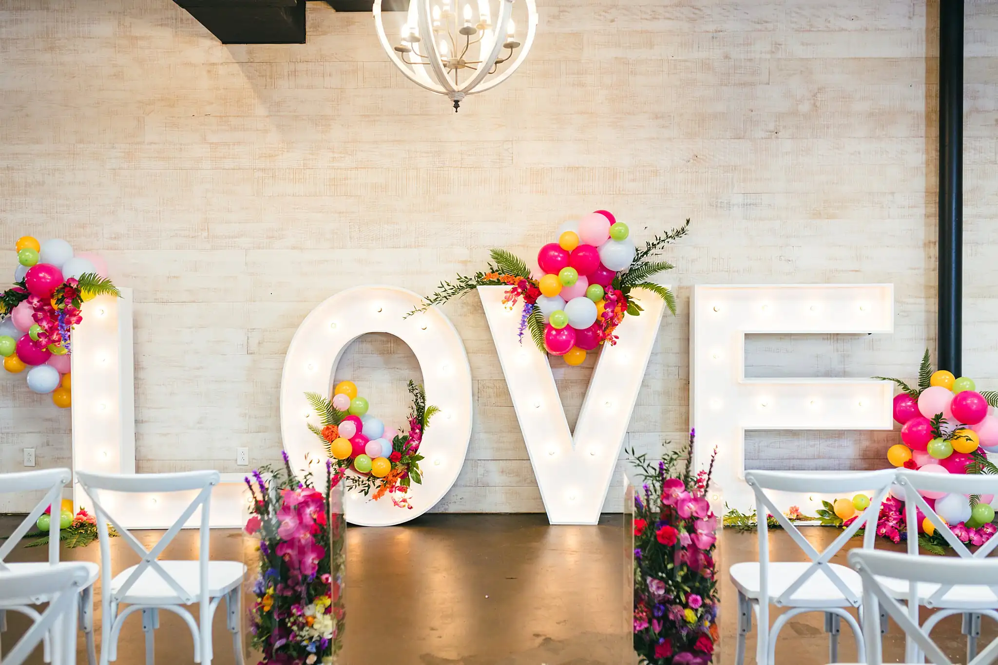 AtlantaWeddingPhotographers_1209.jpg Reception Details: the LOVE letters dressed with balloons, at a Whimsically in Love LGBTQ Wedding styled shoot at Brick and Ivey in Marietta, GA