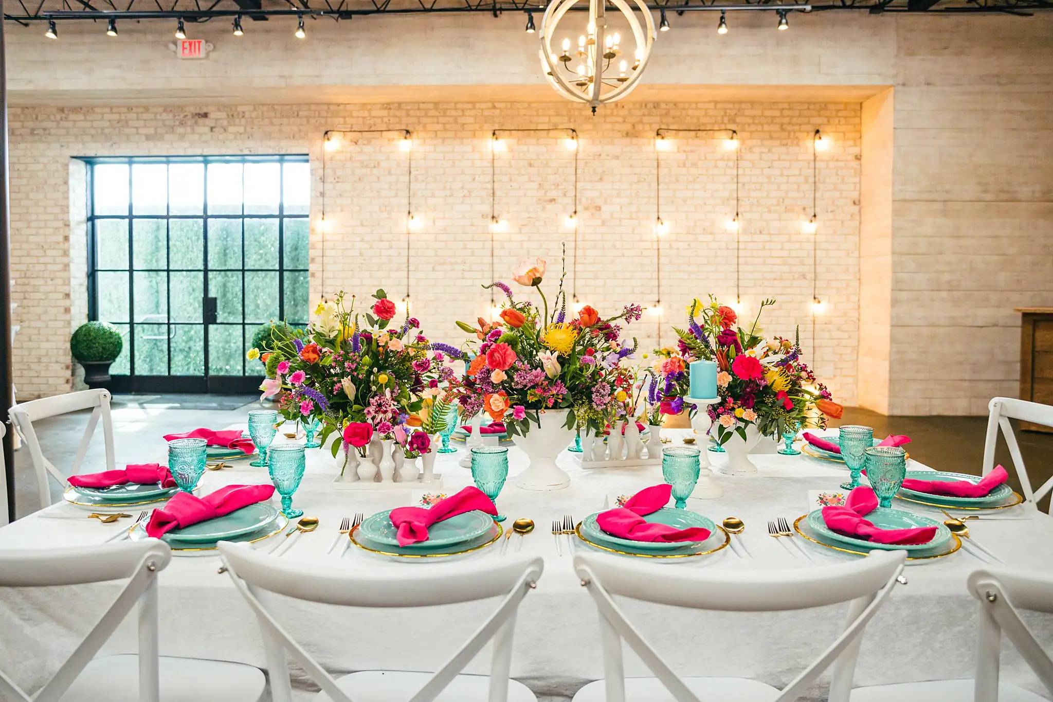 AtlantaWeddingPhotographers_1215.jpg Reception Details: the long table set under hanging bulbs, at a Whimsically in Love LGBTQ Wedding styled shoot at Brick and Ivey in Marietta, GA