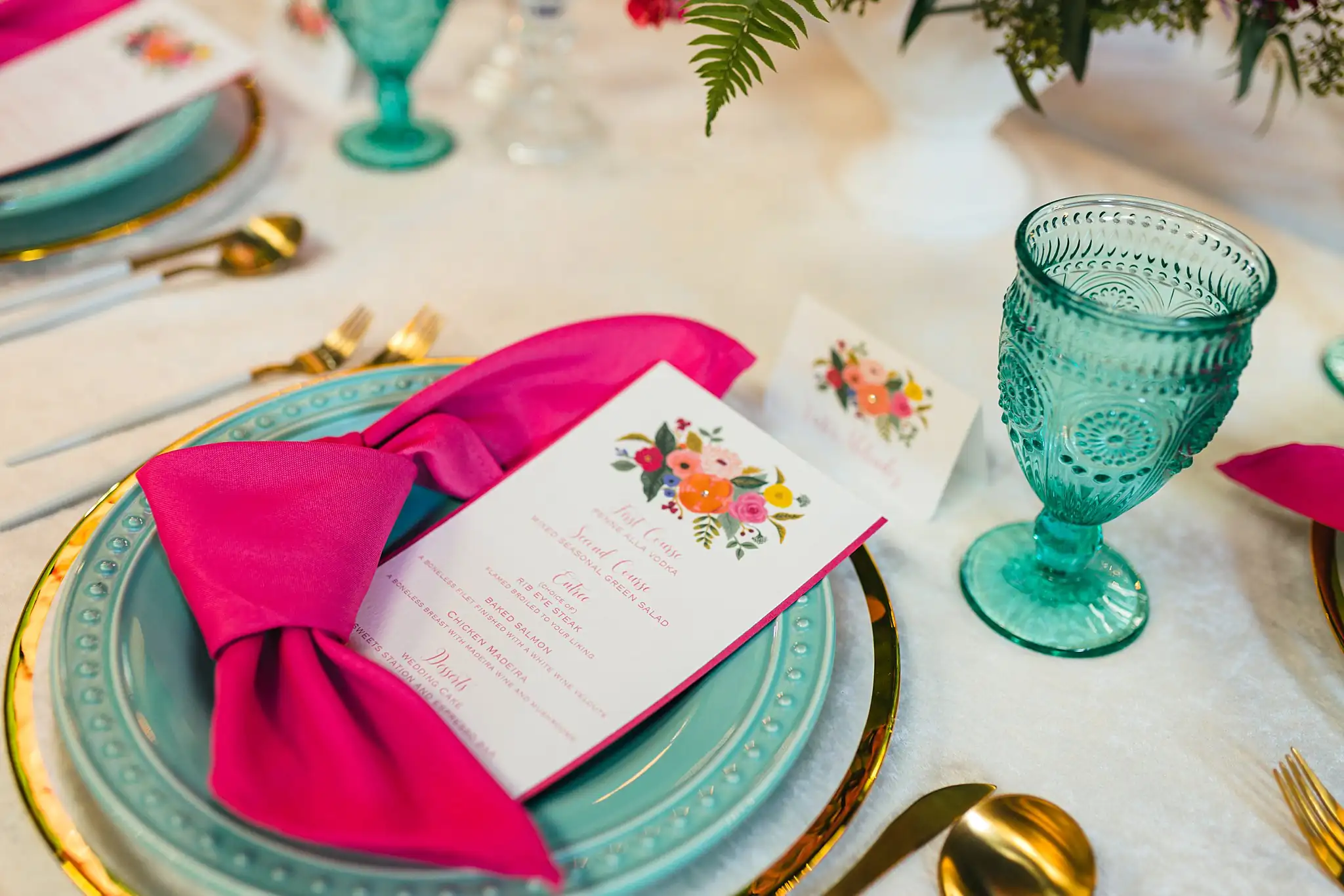 AtlantaWeddingPhotographers_1217.jpg Reception Details: a teal plate, pink napkin and menu, at a Whimsically in Love LGBTQ Wedding styled shoot at Brick and Ivey in Marietta, GA