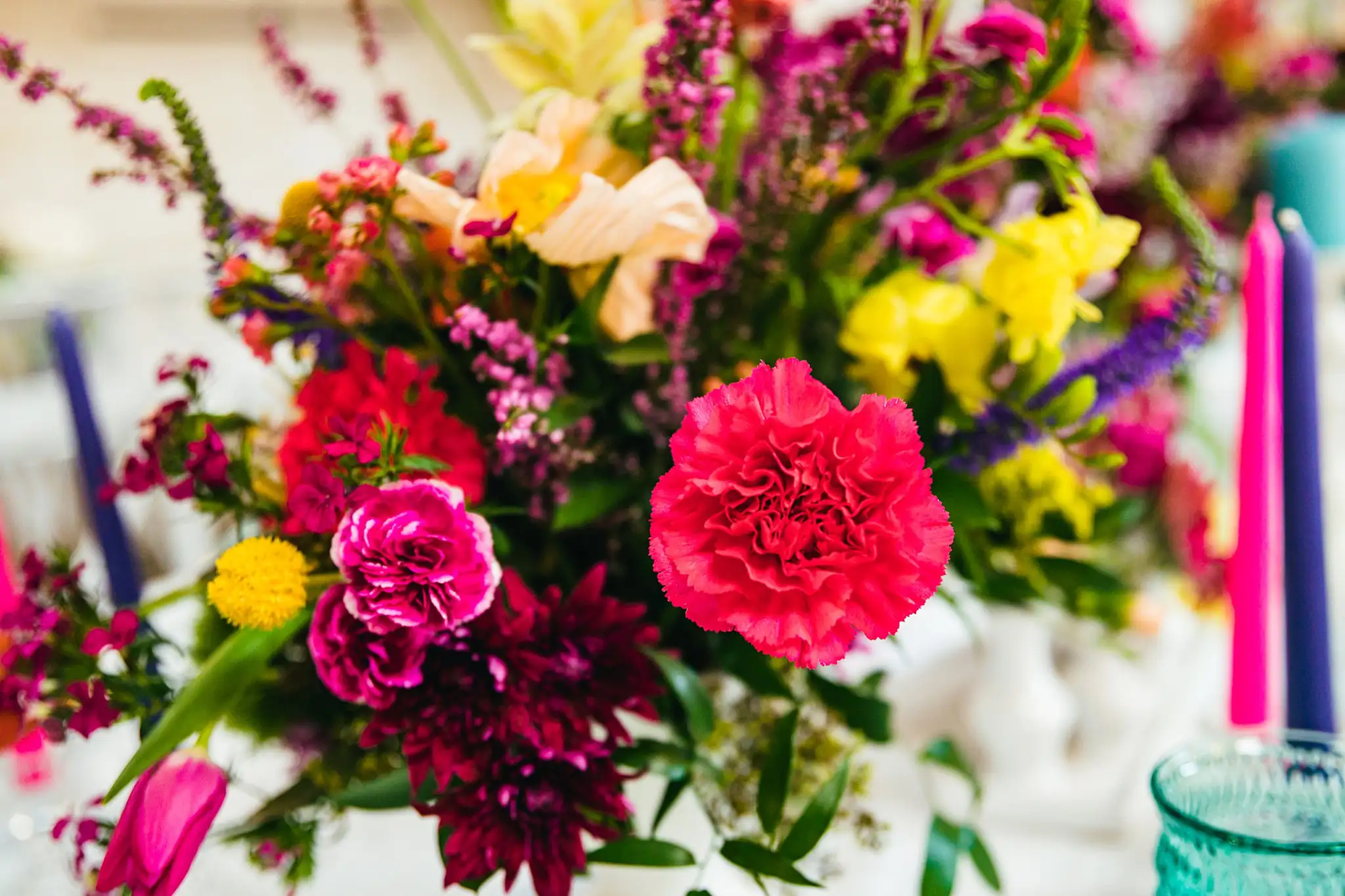 AtlantaWeddingPhotographers_1220.jpg Wedding Florals: carnations, gerberas and astilbe, close, at a Whimsically in Love LGBTQ Wedding styled shoot at Brick and Ivey in Marietta, GA