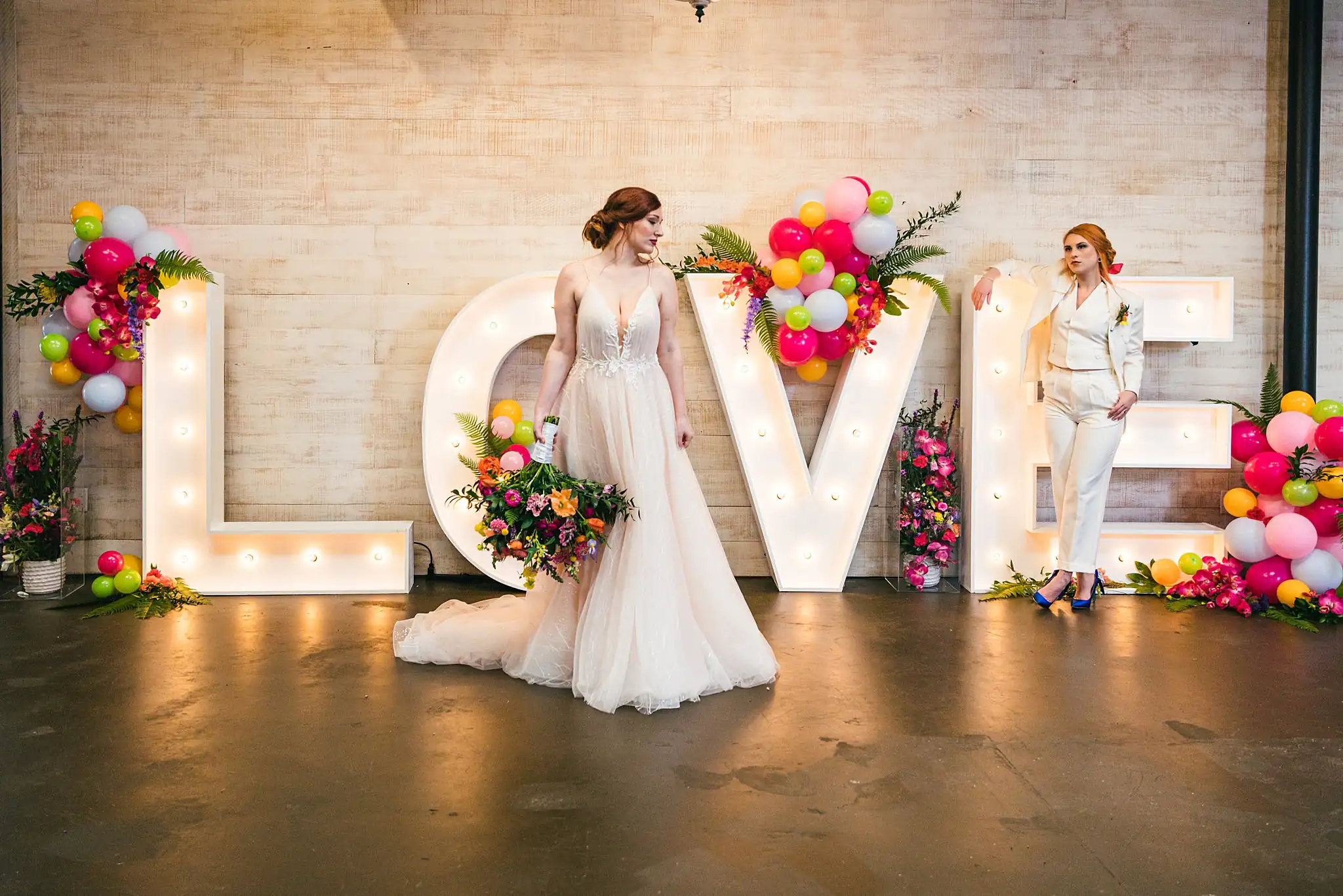 AtlantaWeddingPhotographers_1234.jpg Wedding Formals: the couple standing apart by the letters, at a Whimsically in Love LGBTQ Wedding styled shoot at Brick and Ivey in Marietta, GA