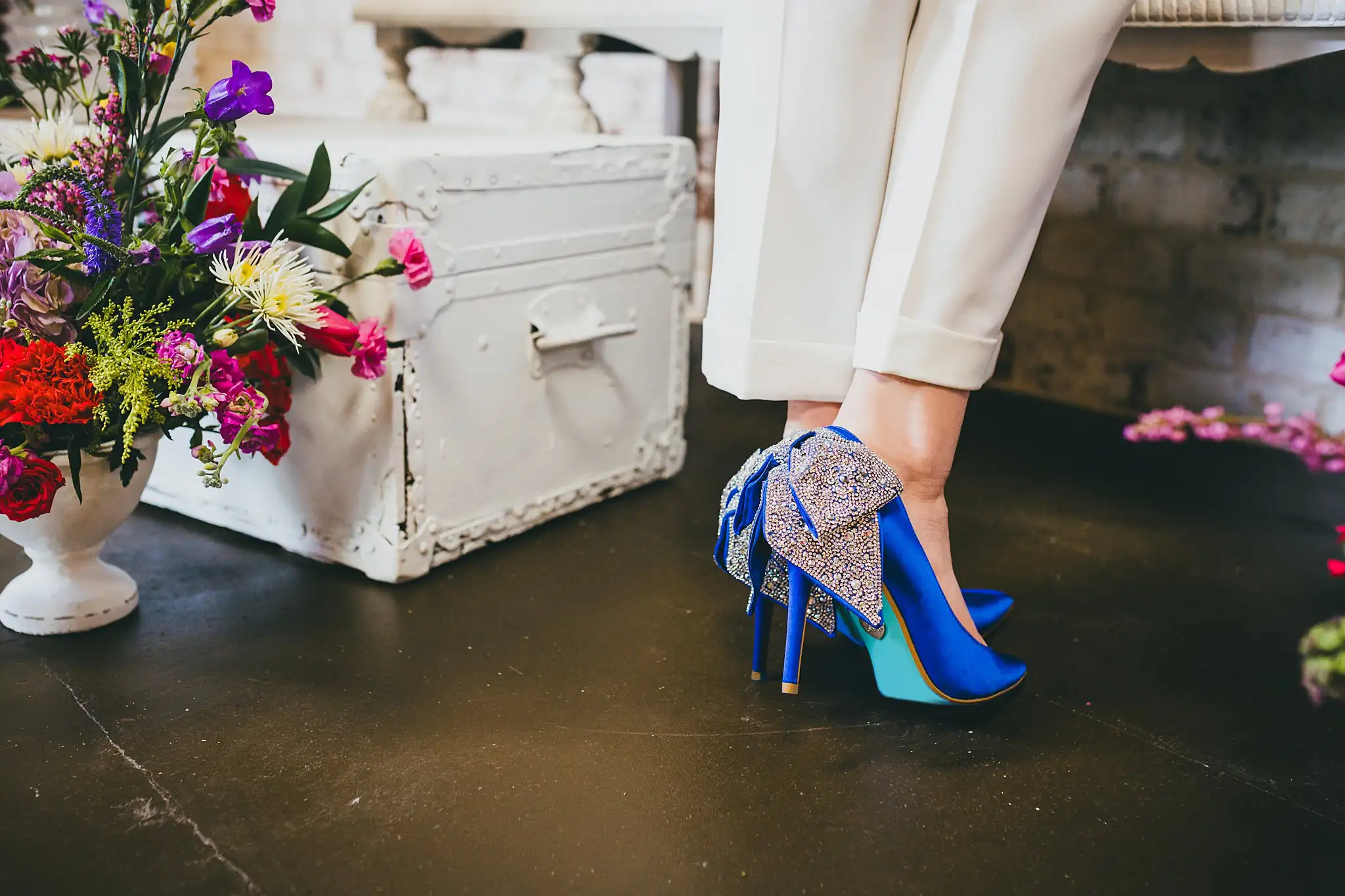 AtlantaWeddingPhotographers_1239.jpg Wedding Details: the blue crystal heels by the white trunk, at a Whimsically in Love LGBTQ Wedding styled shoot at Brick and Ivey in Marietta, GA
