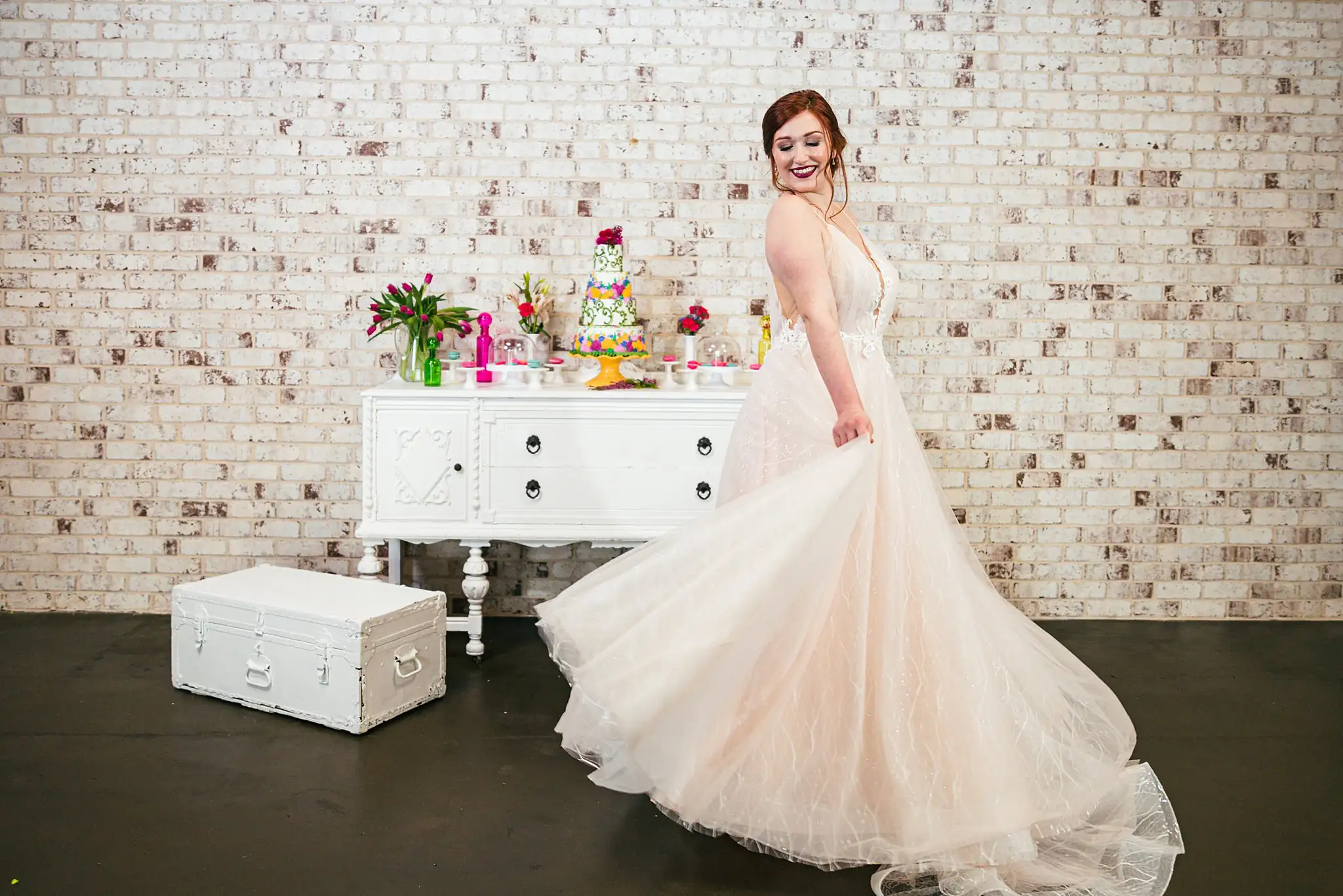 AtlantaWeddingPhotographers_1243.jpg Bridal Portraits: the bride in the gown, her skirt spread, at a Whimsically in Love LGBTQ Wedding styled shoot at Brick and Ivey in Marietta, GA