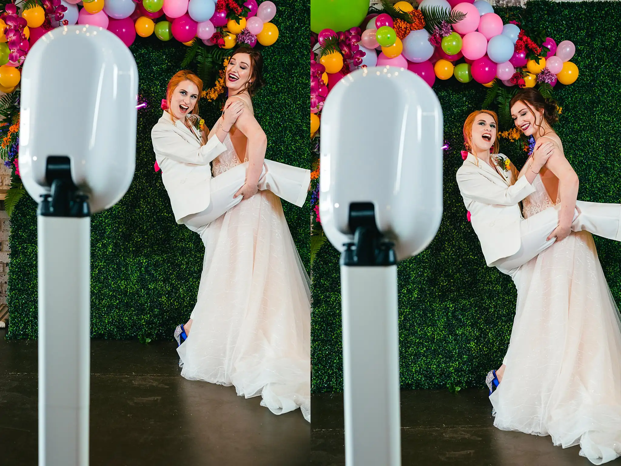 Wedding Reception: the couple at the photo booth wall, at a Whimsically in Love LGBTQ Wedding styled shoot at Brick and Ivey in Marietta, GA