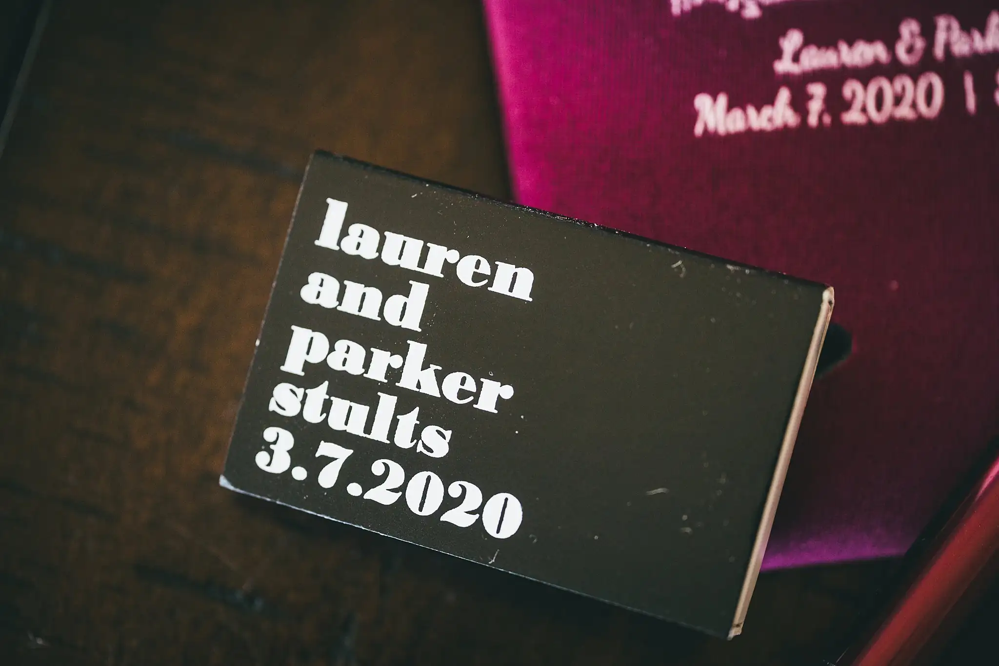 Wedding Details: the printed matchbox and koozie favours, at a wedding at Ashton Gardens Atlanta in Sugar Hill, GA