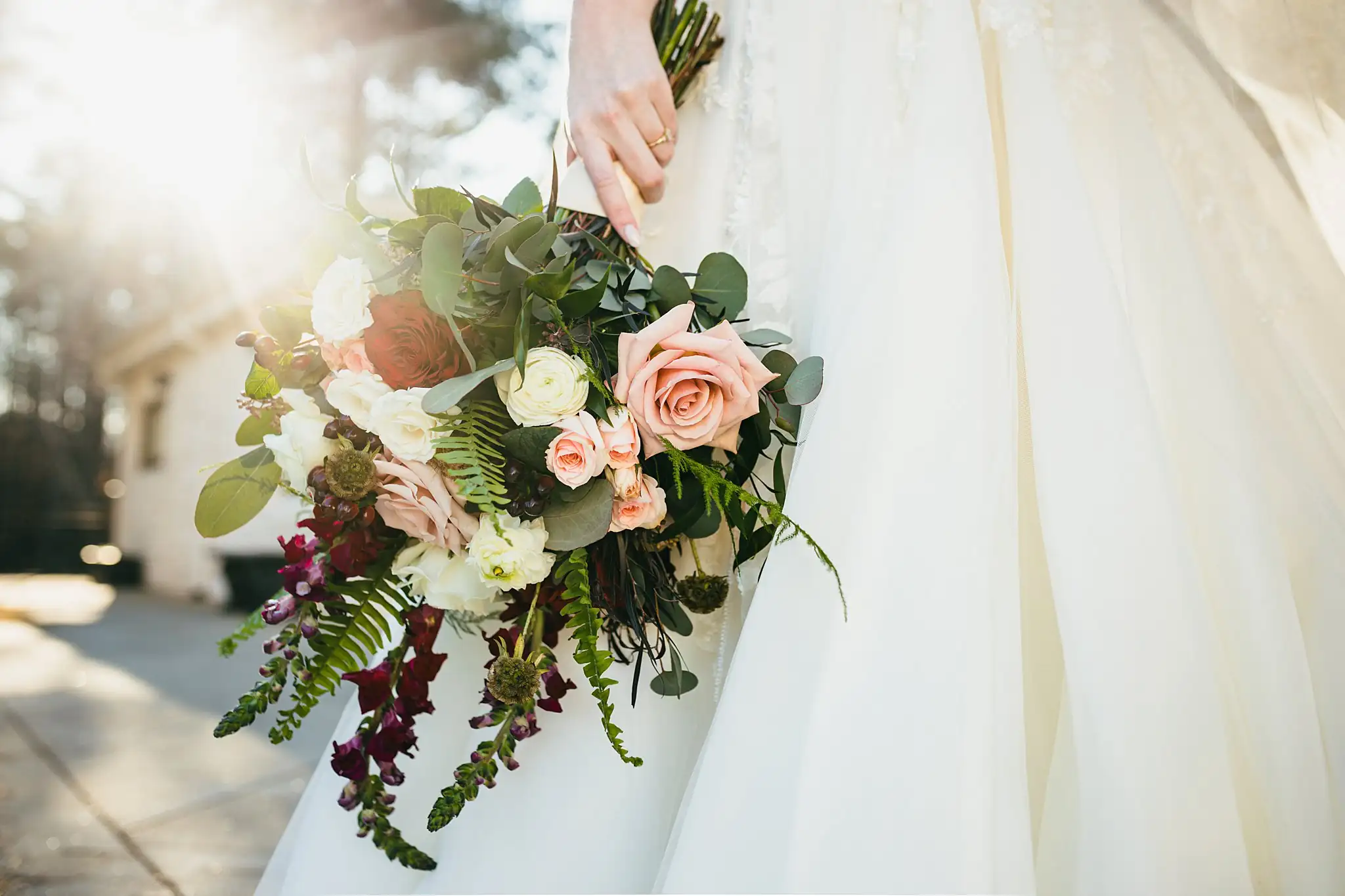 Wedding Florals: blush roses and burgundy amaranth with ferns, at their wedding at Ashton Gardens Atlanta in Sugar Hill, GA