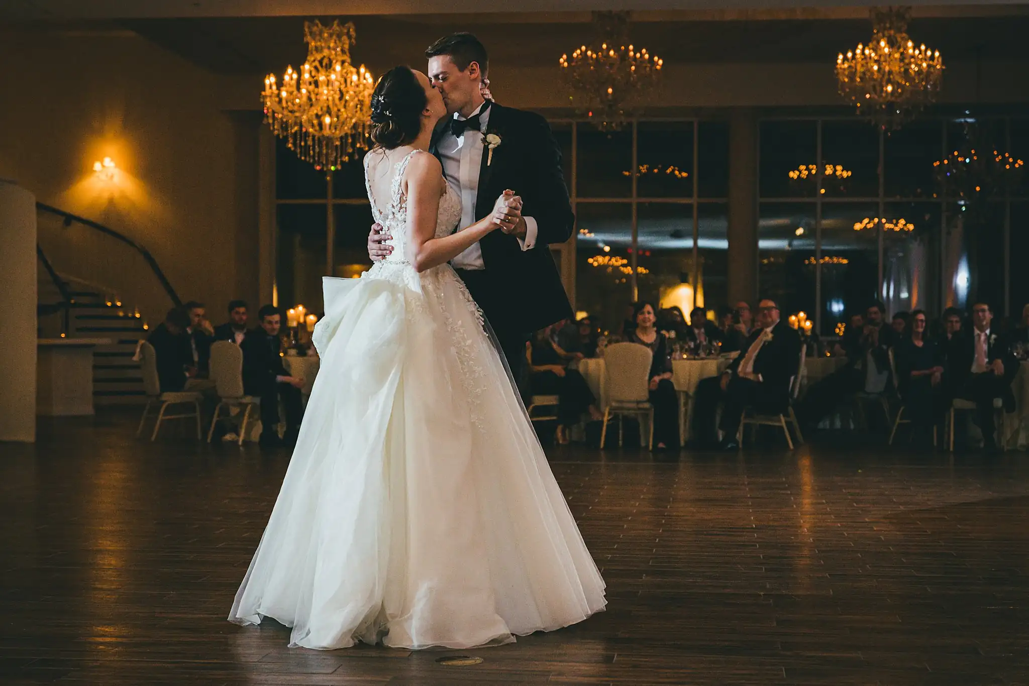 First Dance: the couple dancing as their guests watch, at their wedding at Ashton Gardens Atlanta in Sugar Hill, GA
