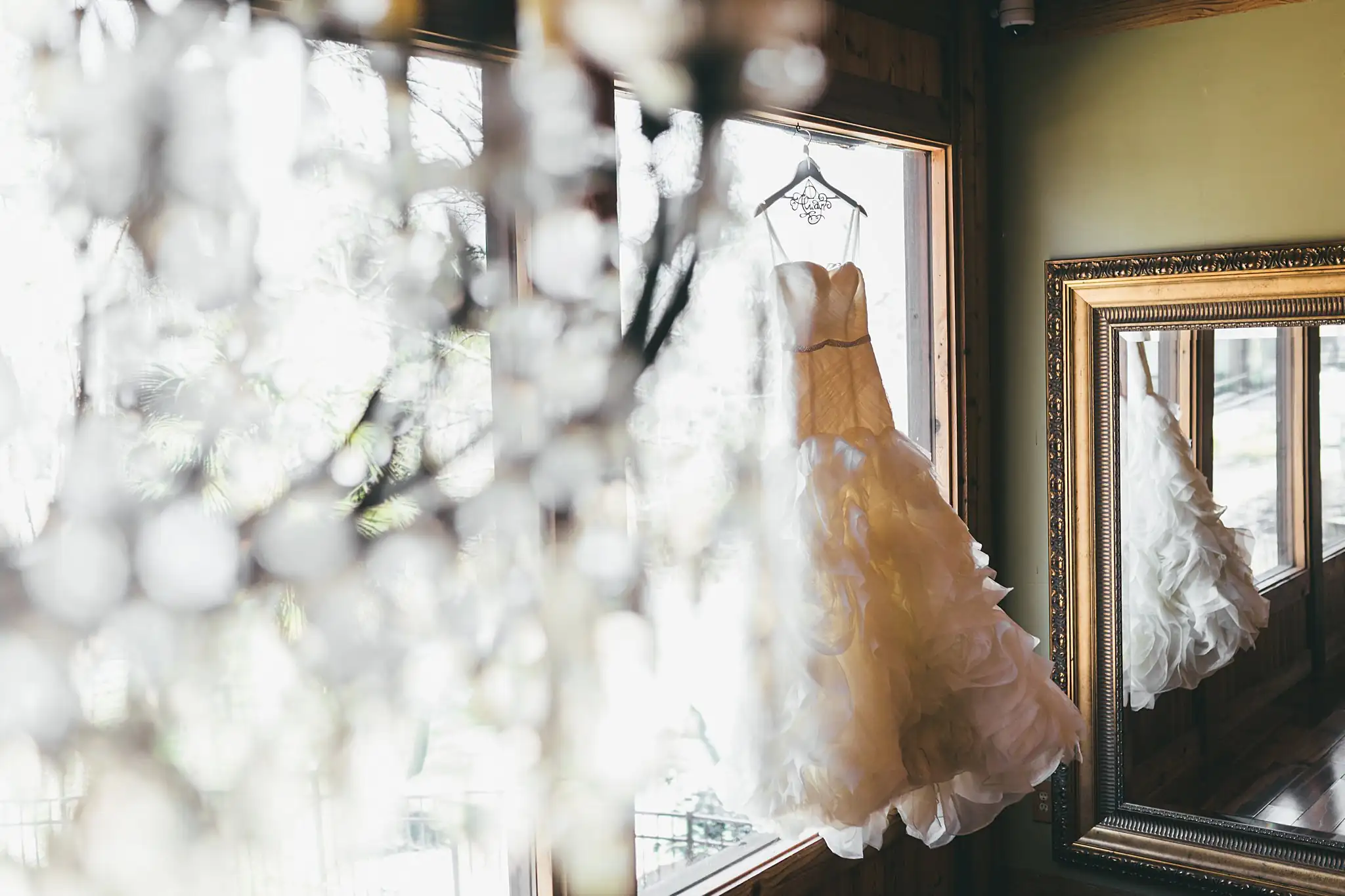 AtlantaWeddingPhotographers_1412.jpg Wedding Details: the ruffled gown reflected in a mirror, at a wedding at Three Birches in Alpharetta, GA