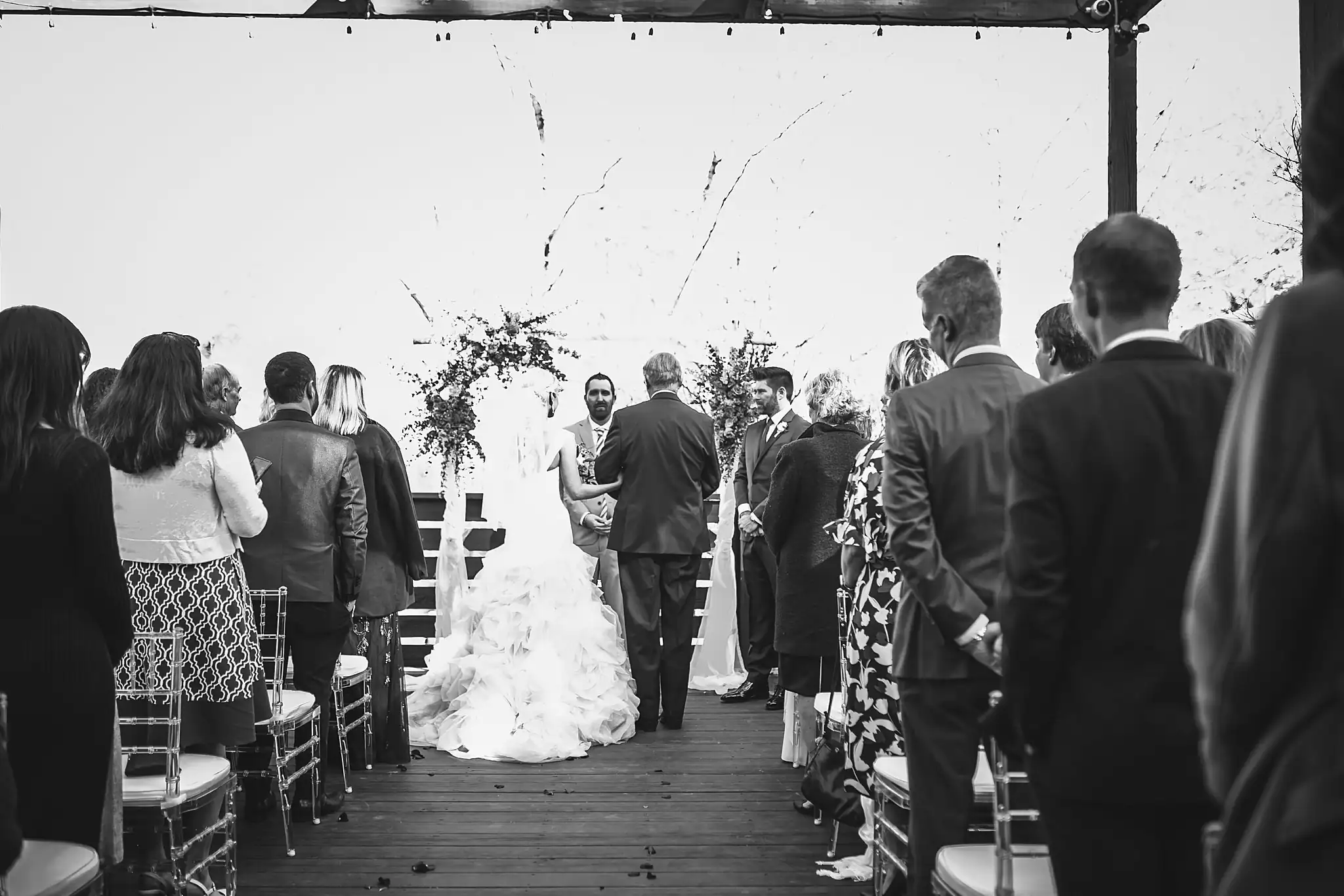 AtlantaWeddingPhotographers_1438.jpg Wedding Ceremony: the ceremony from behind the guests, at their wedding at Three Birches in Alpharetta, GA