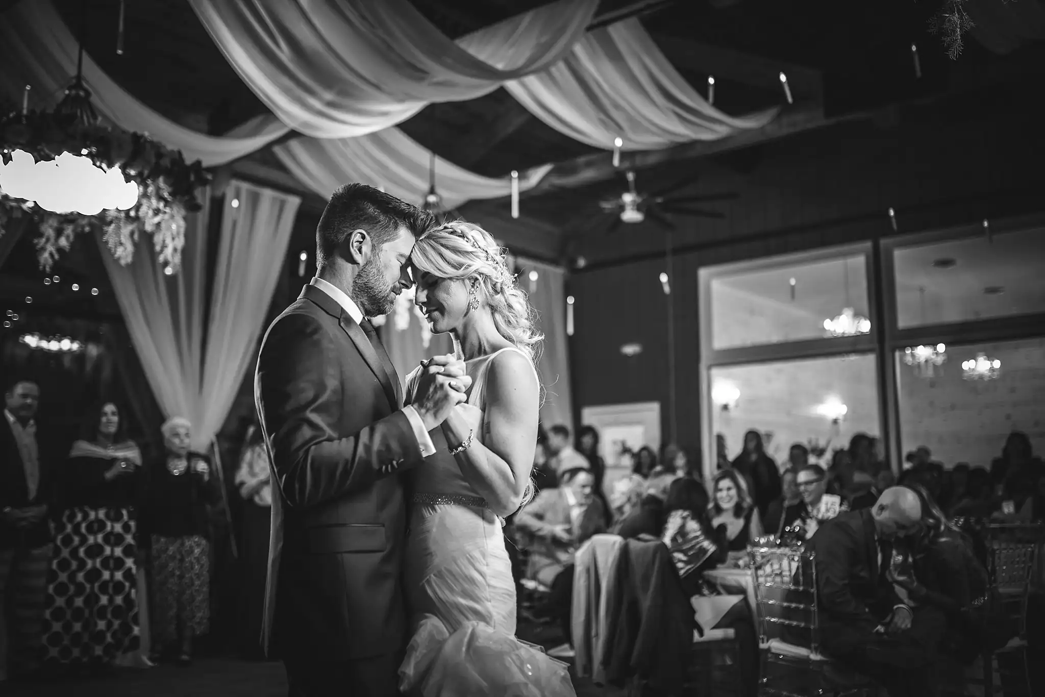 AtlantaWeddingPhotographers_1477.jpg First Dance: the couple dancing as their guests watch, at their wedding at Three Birches in Alpharetta, GA