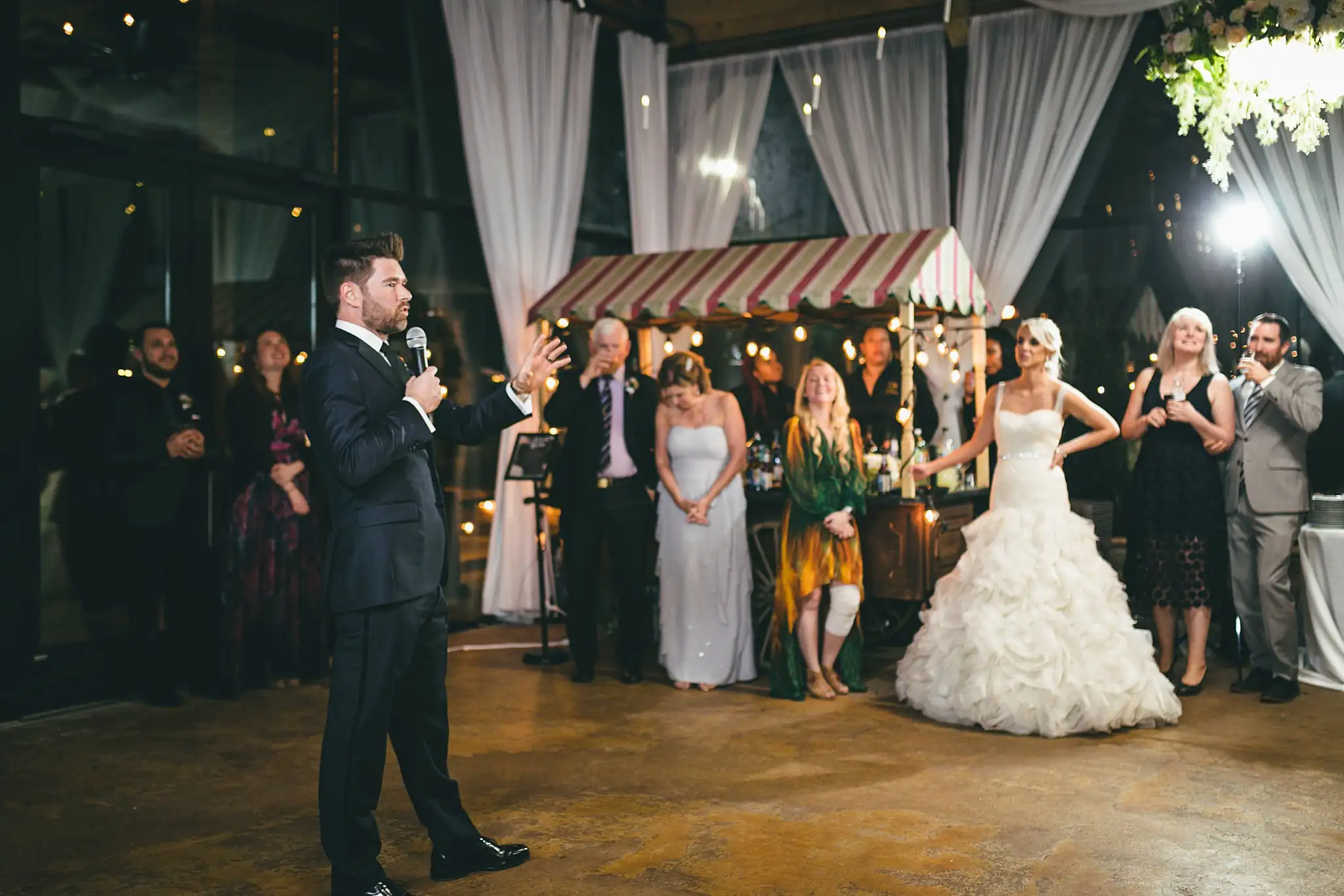 AtlantaWeddingPhotographers_1480.jpg Wedding Reception: a toast given beside the couple, at their wedding at Three Birches in Alpharetta, GA