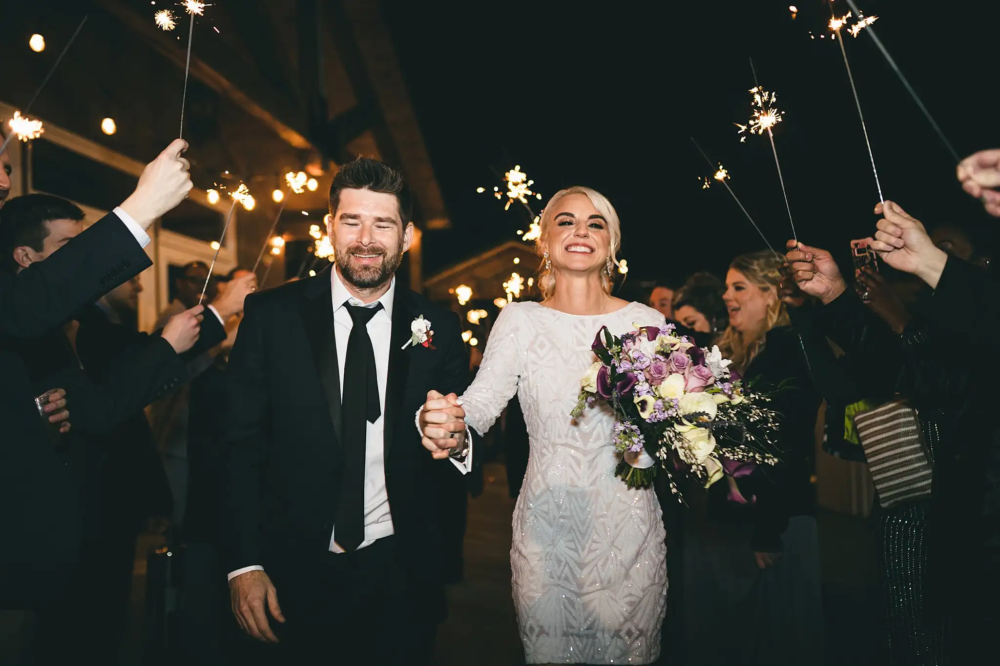 AtlantaWeddingPhotographers_1487.jpg Sparkler Exit: the bride in her second dress walking out, at their wedding at Three Birches in Alpharetta, GA