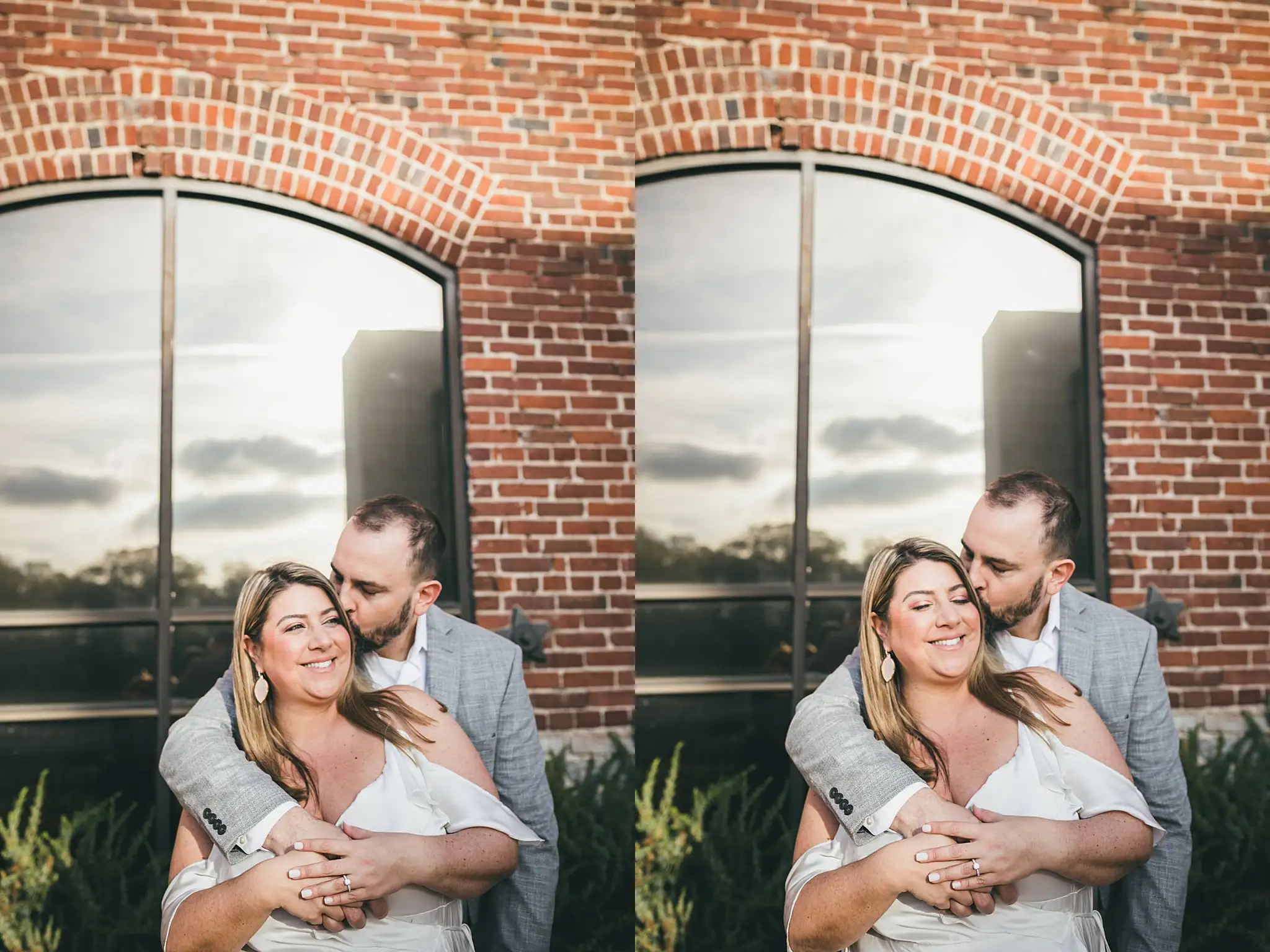 Engagement Portraits: the two of them at the arched brick windows, in a set, during their engagement session at Marietta Square in Marietta, GA