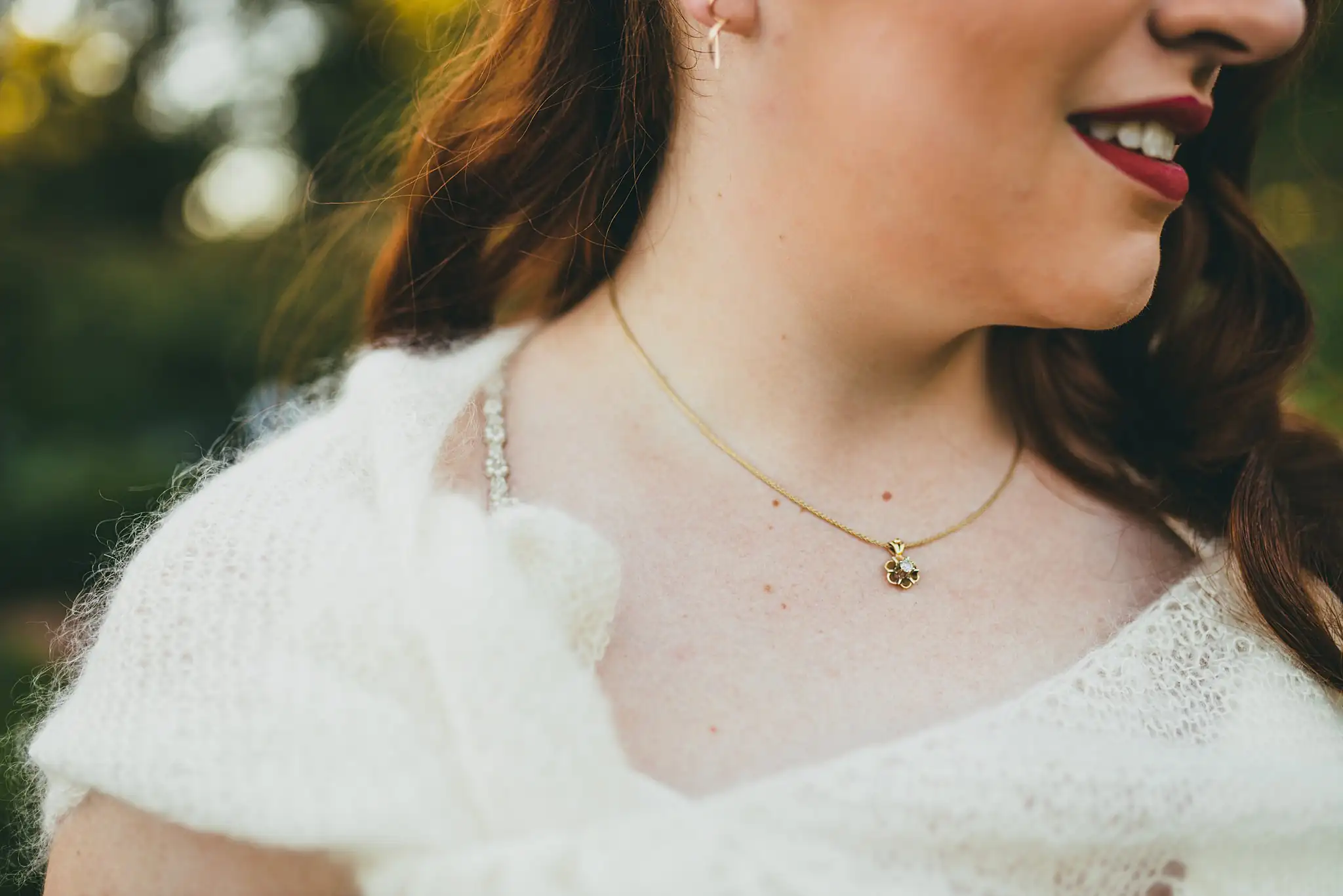 AtlantaWeddingPhotographers_1581.jpg Wedding Details: her pendant necklace over a white knit shawl, at their tiny wedding at Barrington Hall in Roswell, GA