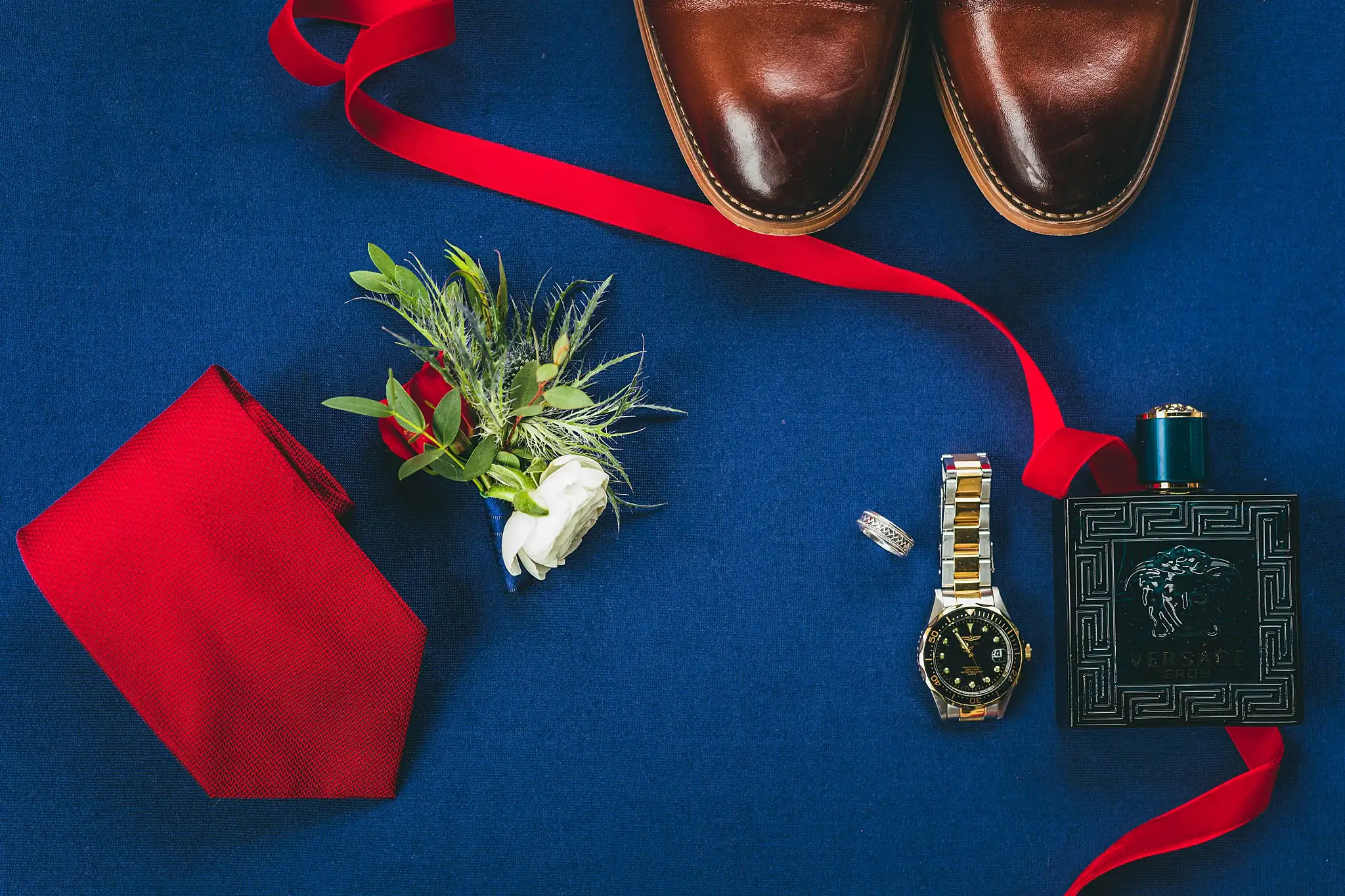 Styled Shoot Hollywood Regency Wedding Inspiration Atlanta Photographers Wedding Details: the groom's oxfords and red tie on blue velvet, at a Hollywood Regency Wedding styled shoot at the Foxglove in Marietta, GA