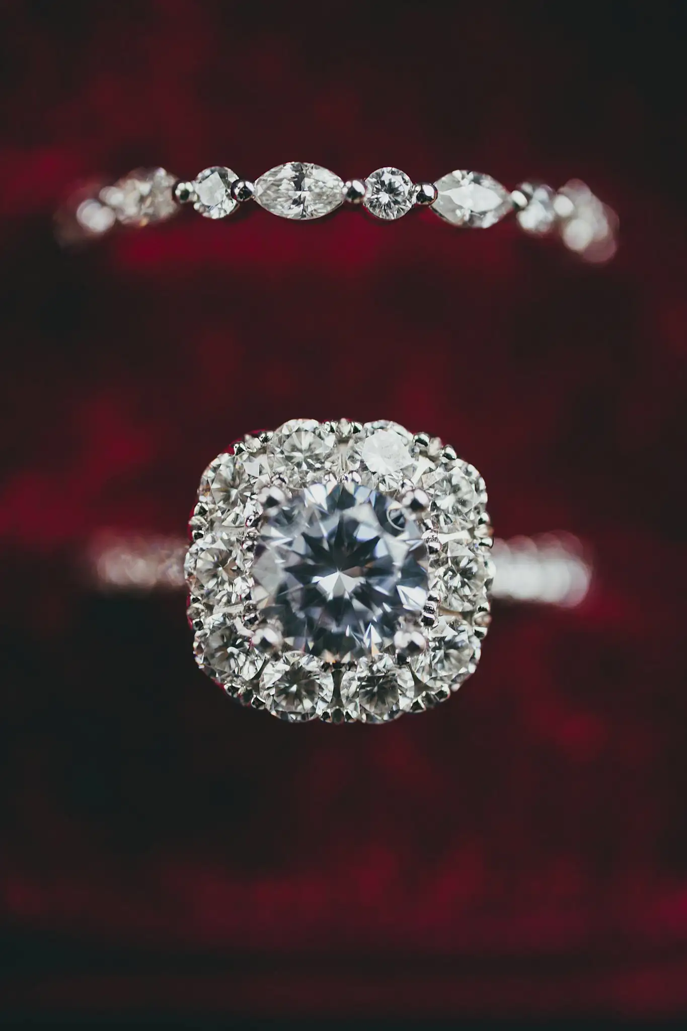 Styled Shoot Hollywood Regency Wedding Inspiration Atlanta Photographers Wedding Details: the cushion-cut halo engagement ring on red velvet, at a Hollywood Regency Wedding styled shoot at the Foxglove in Marietta, GA