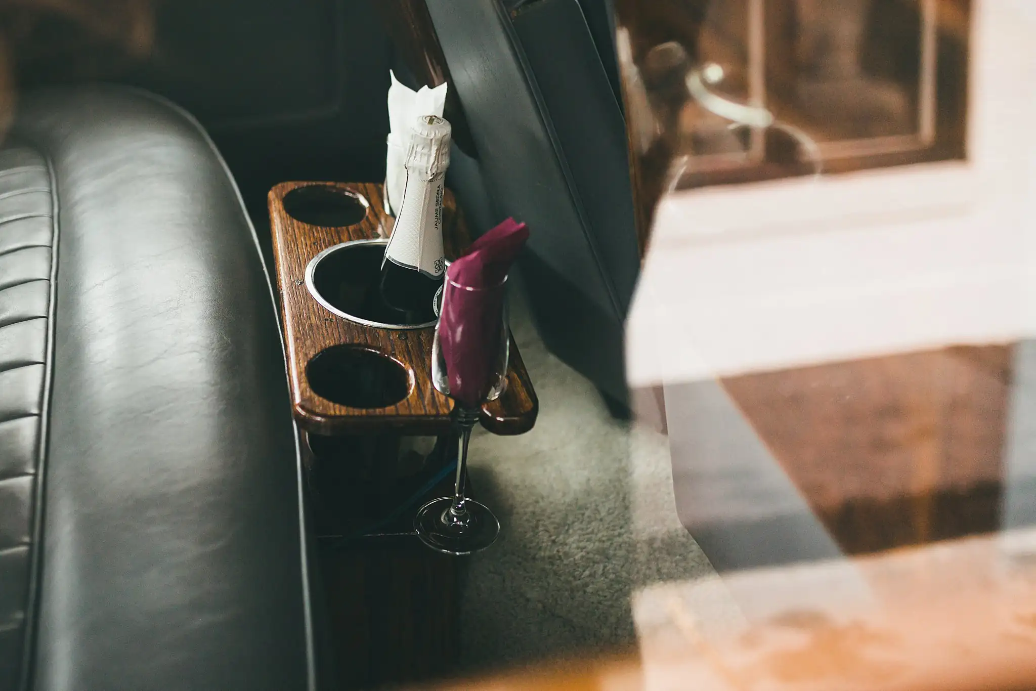 Styled Shoot Hollywood Regency Wedding Inspiration Atlanta Photographers Wedding Details: champagne on the tray in the back of the car, at a Hollywood Regency Wedding styled shoot at the Foxglove in Marietta, GA