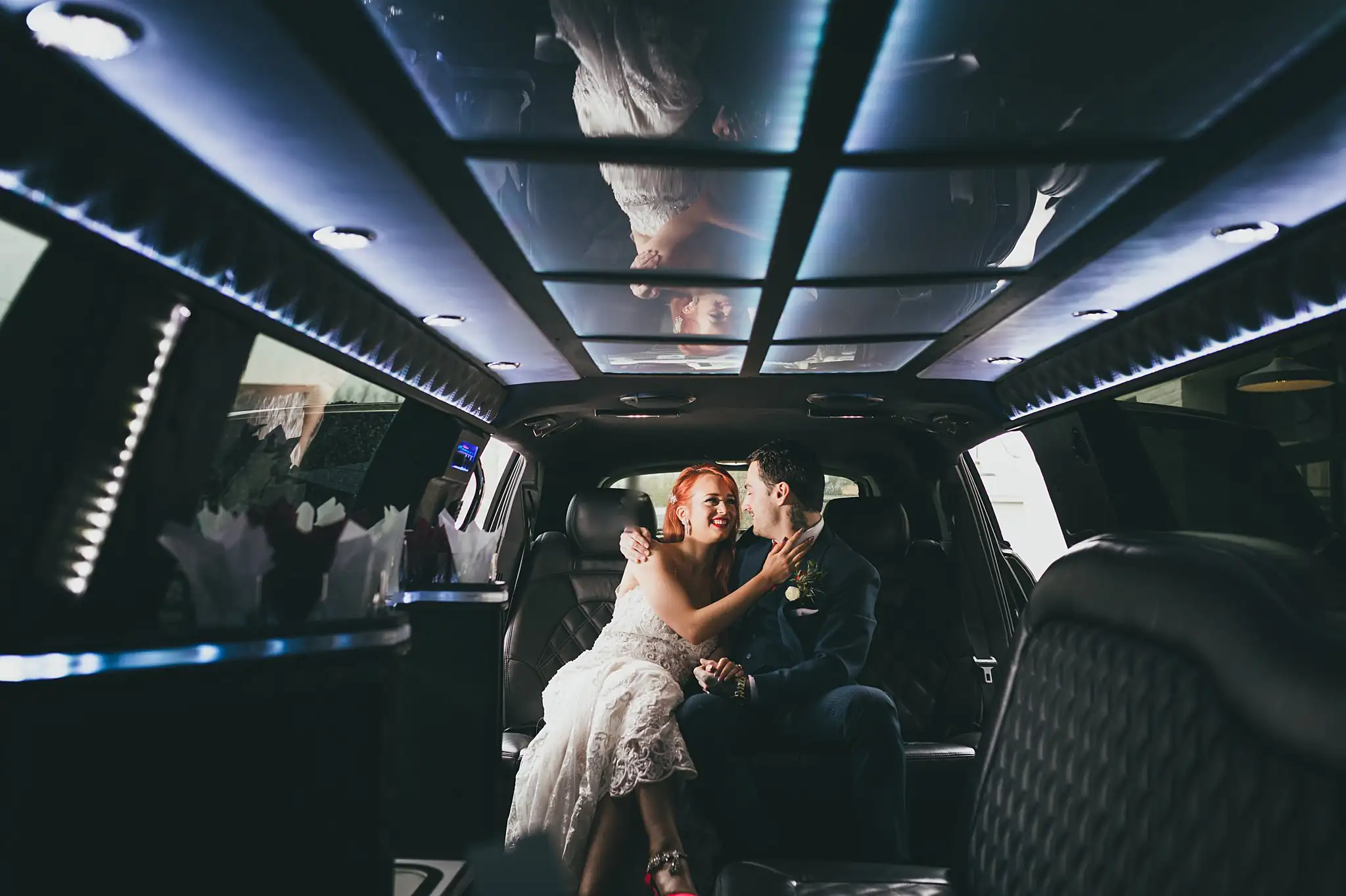 Styled Shoot Hollywood Regency Wedding Inspiration Atlanta Photographers Wedding Formals: the couple side by side in the lit car interior, at a Hollywood Regency Wedding styled shoot at the Foxglove in Marietta, GA