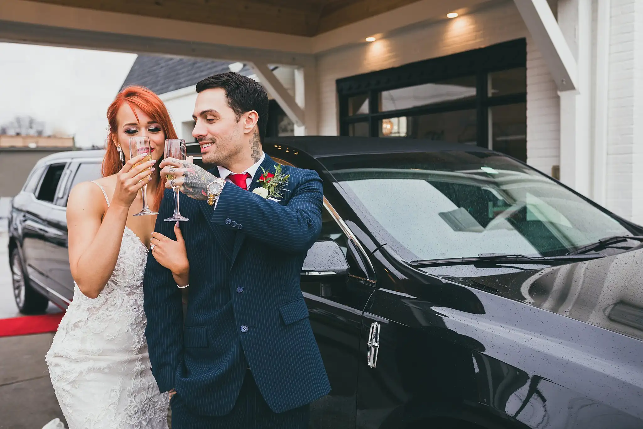Styled Shoot Hollywood Regency Wedding Inspiration Atlanta Photographers Wedding Formals: the couple toasting with champagne beside the car, at a Hollywood Regency Wedding styled shoot at the Foxglove in Marietta, GA