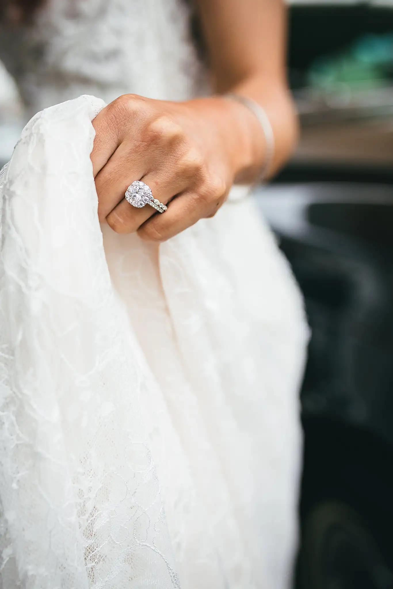 Styled Shoot Hollywood Regency Wedding Inspiration Atlanta Photographers Wedding Details: the bride's hand gathering her lace skirt, at a Hollywood Regency Wedding styled shoot at the Foxglove in Marietta, GA