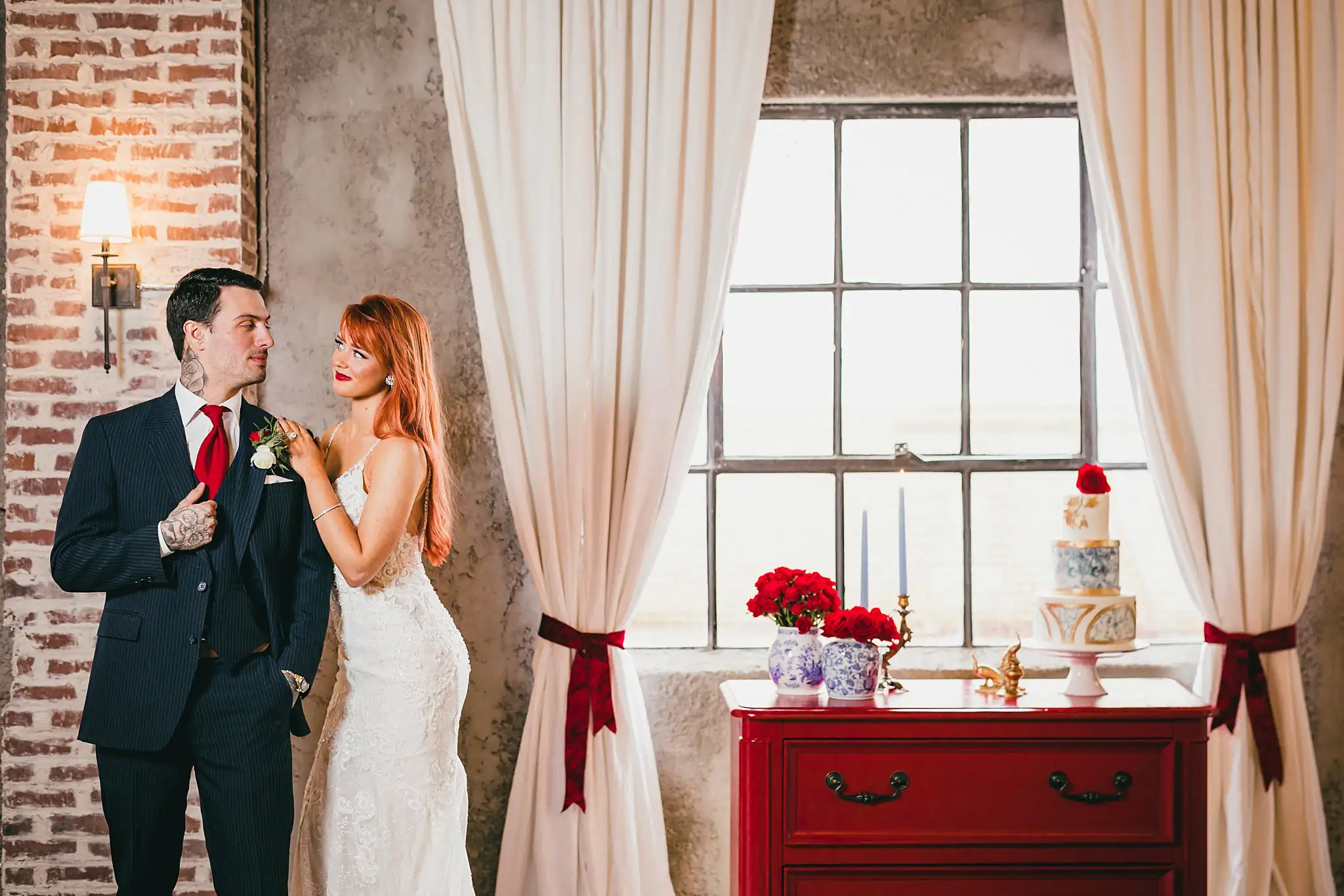 Styled Shoot Hollywood Regency Wedding Inspiration Atlanta Photographers Wedding Formals: the couple beside the cake table, at a Hollywood Regency Wedding styled shoot at the Foxglove in Marietta, GA
