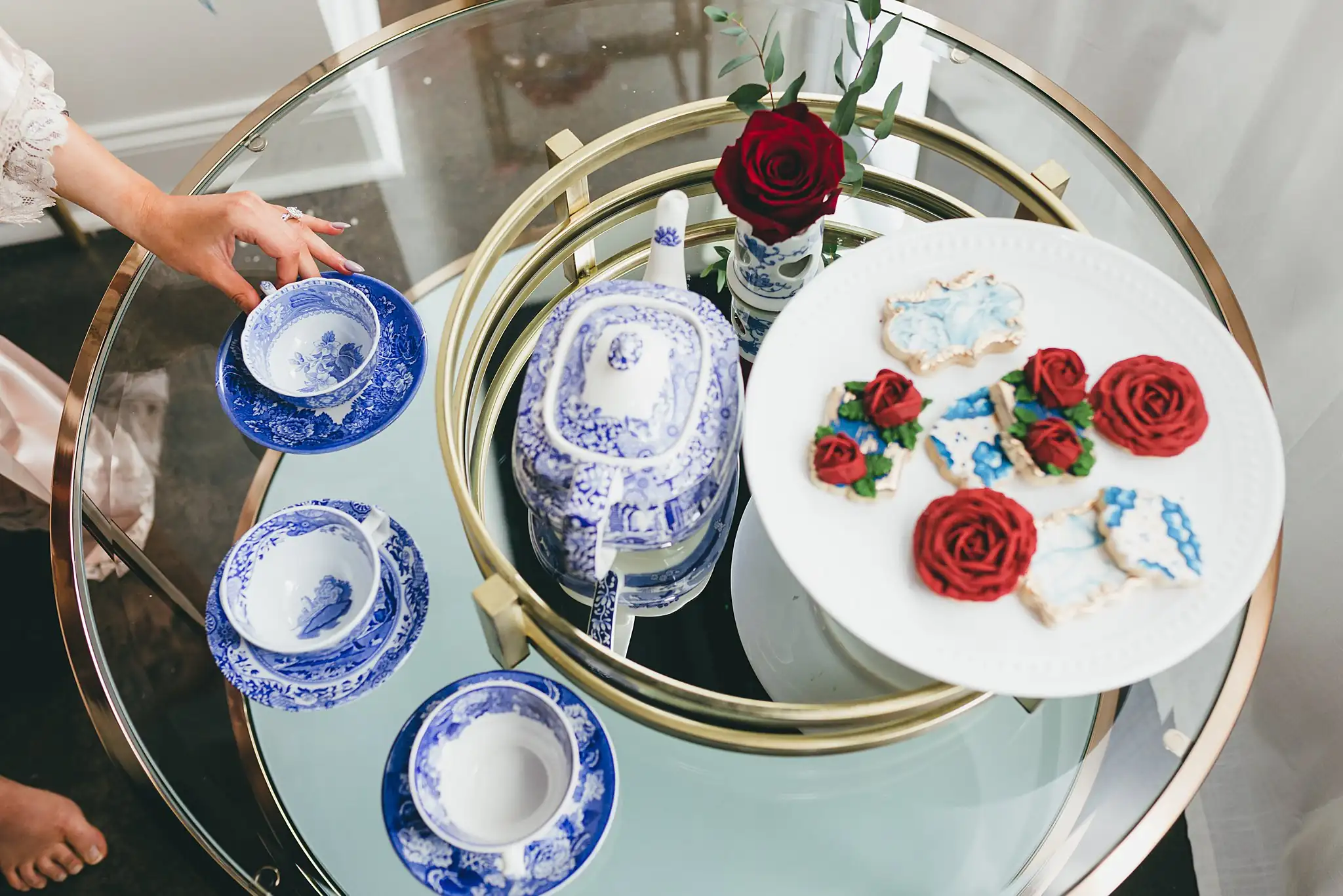 Styled Shoot Hollywood Regency Wedding Inspiration Atlanta Photographers Reception Details: blue-and-white china and rose cookies on a tray, at a Hollywood Regency Wedding styled shoot at the Foxglove in Marietta, GA