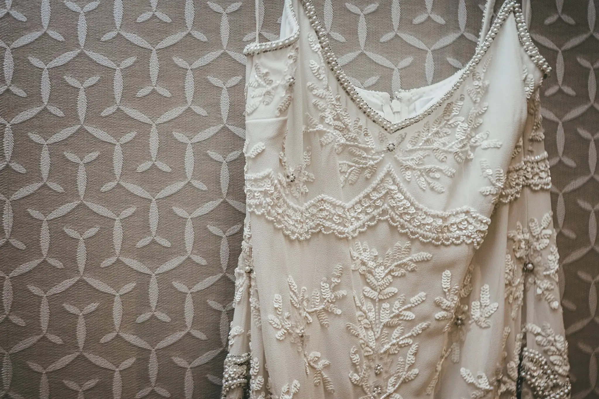 Wedding Details: the beaded bodice of the wedding gown, at a wedding at the Atlanta Botanical Garden in Atlanta, GA