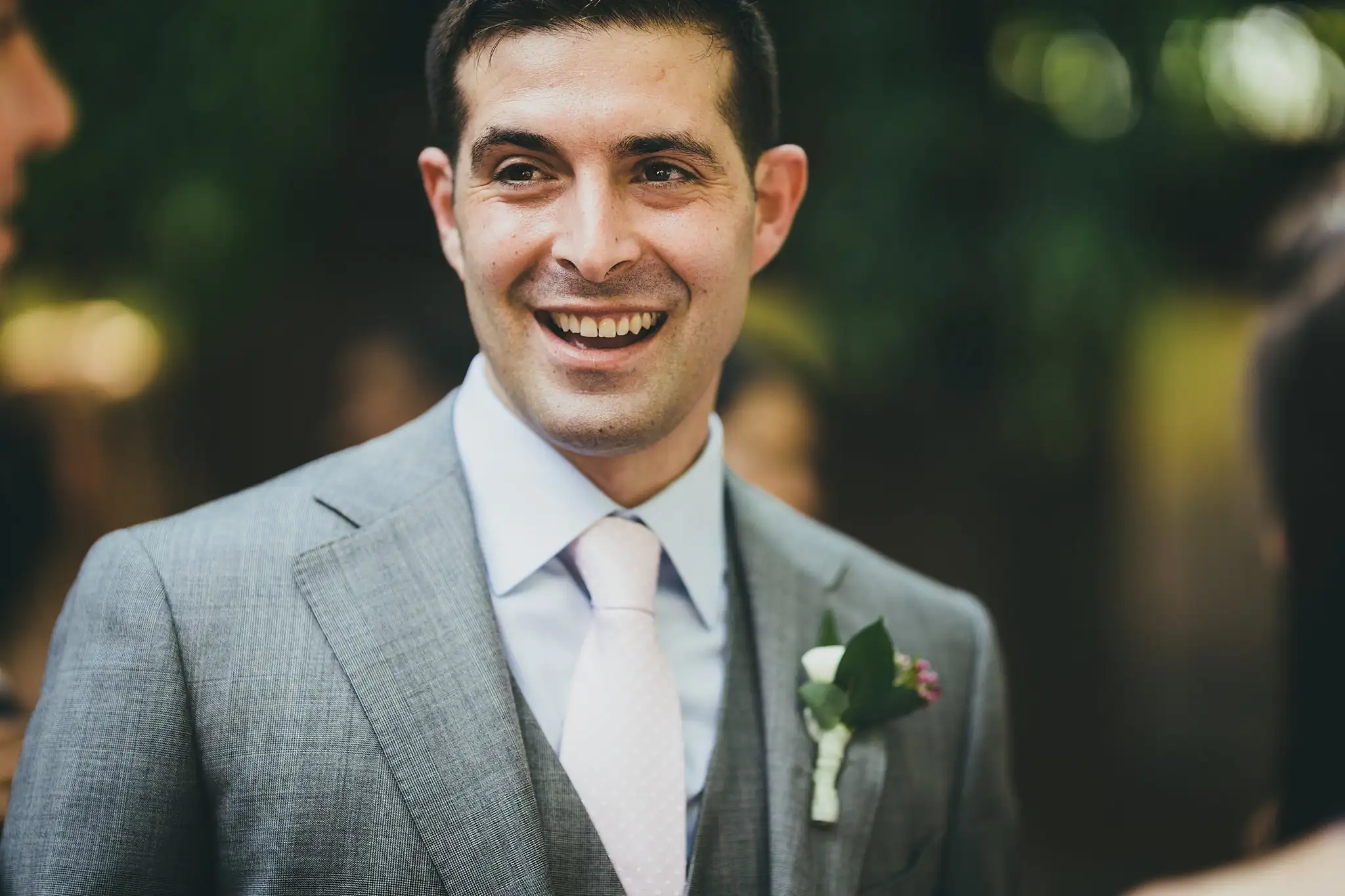 Wedding Formals: the groom in his grey three-piece suit, at their wedding at the Atlanta Botanical Garden in Atlanta, GA