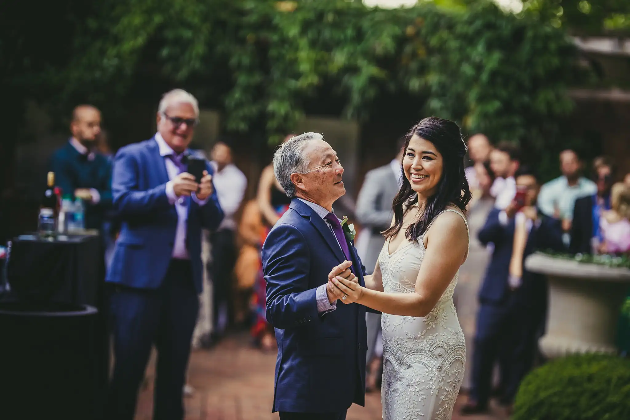 Parent Dance: the bride dancing with her father, at their wedding at the Atlanta Botanical Garden in Atlanta, GA