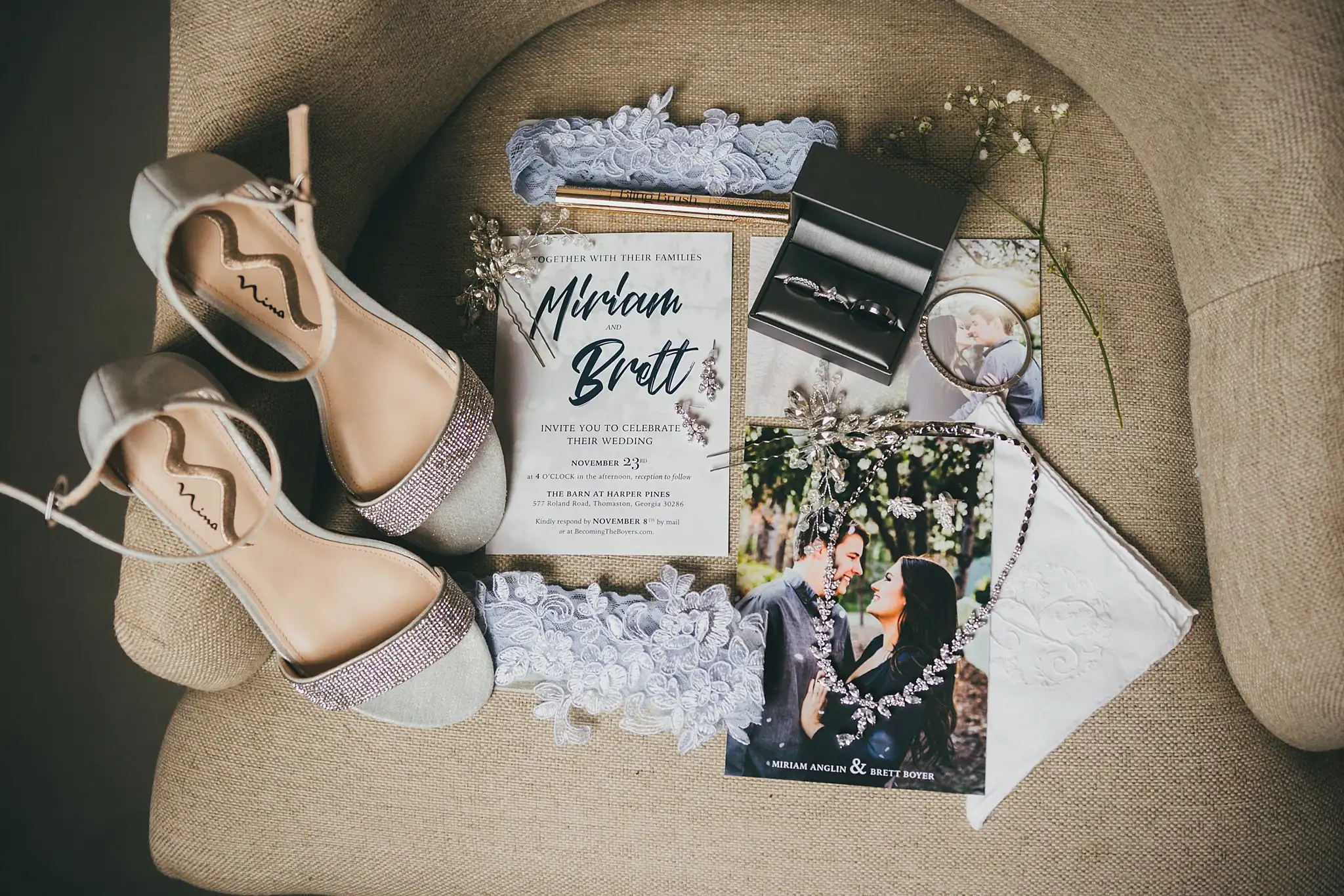 Barn at Harper Pines Wedding Thomaston, GA Atlanta Wedding Photographers Wedding Details: bridal shoes, the invitation and jewelry laid out on burlap, at a wedding at the Barn at Harper Pines in Thomaston, GA